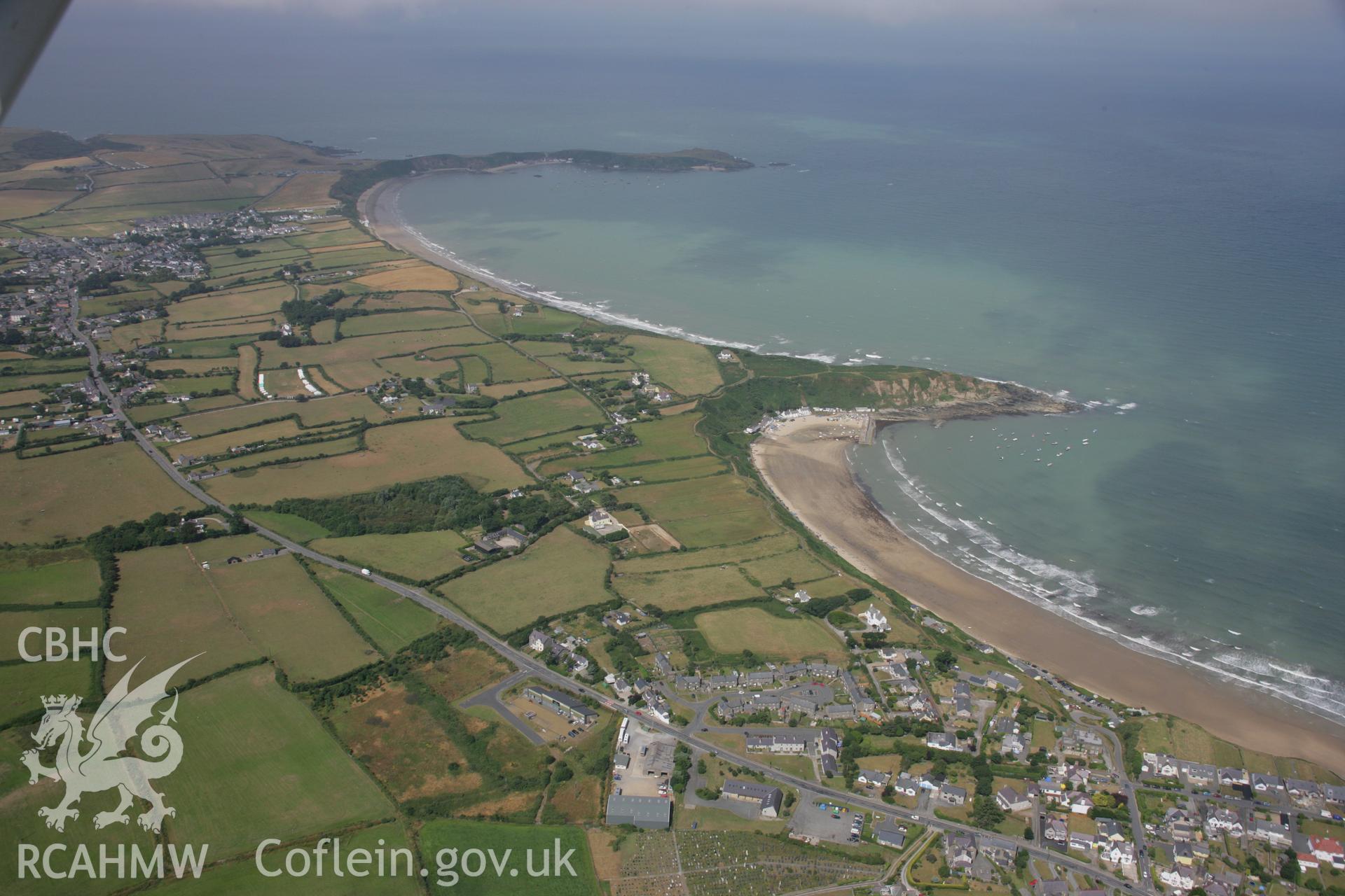 RCAHMW colour oblique aerial photograph of relict field boundaries at Penrhyn Nefyn. A coastal landscape view looking west to Porth-Dinllaen. Taken on 03 August 2006 by Toby Driver.