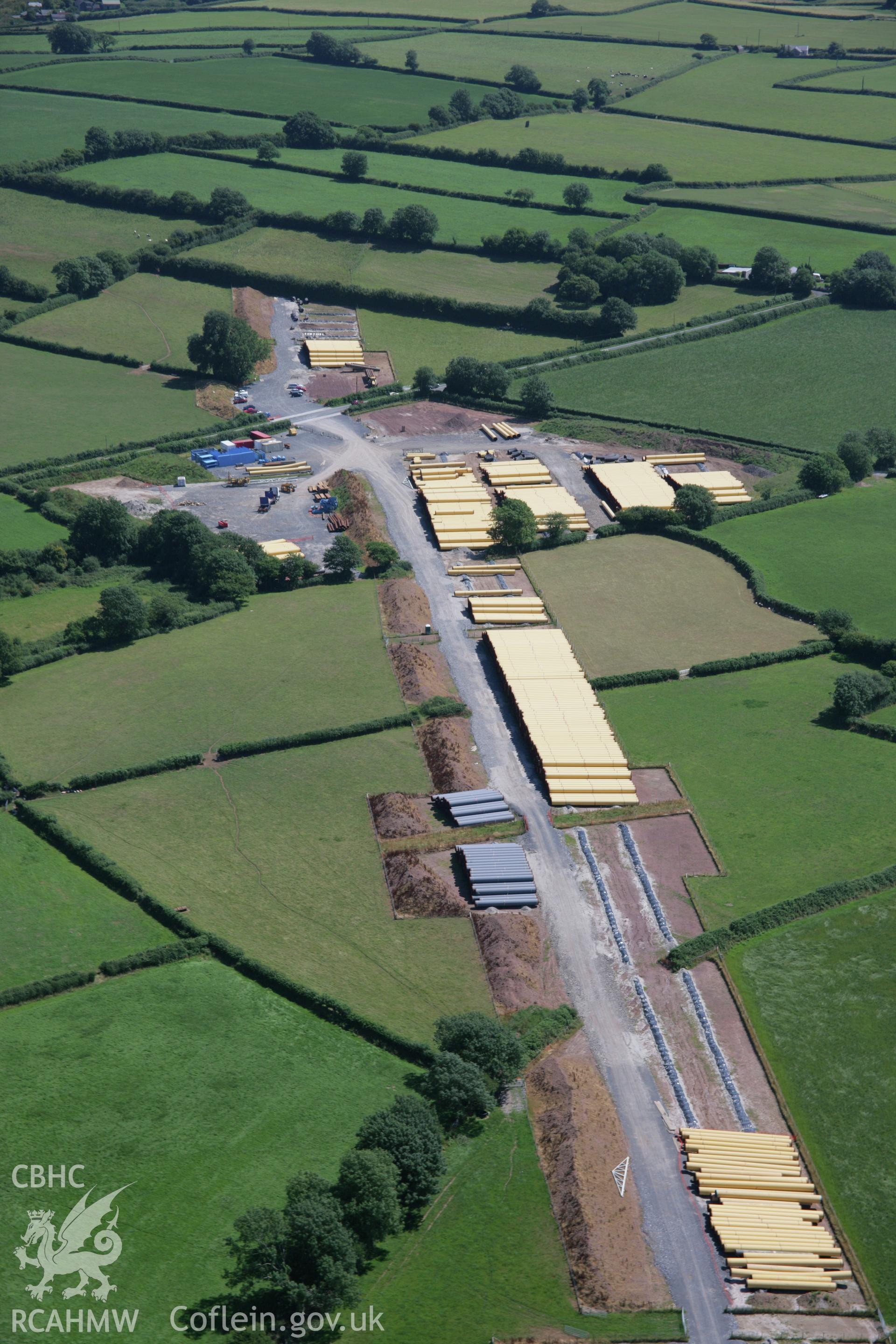 RCAHMW colour oblique aerial photograph of gas pipeline depot. Taken on 24 July 2006 by Toby Driver