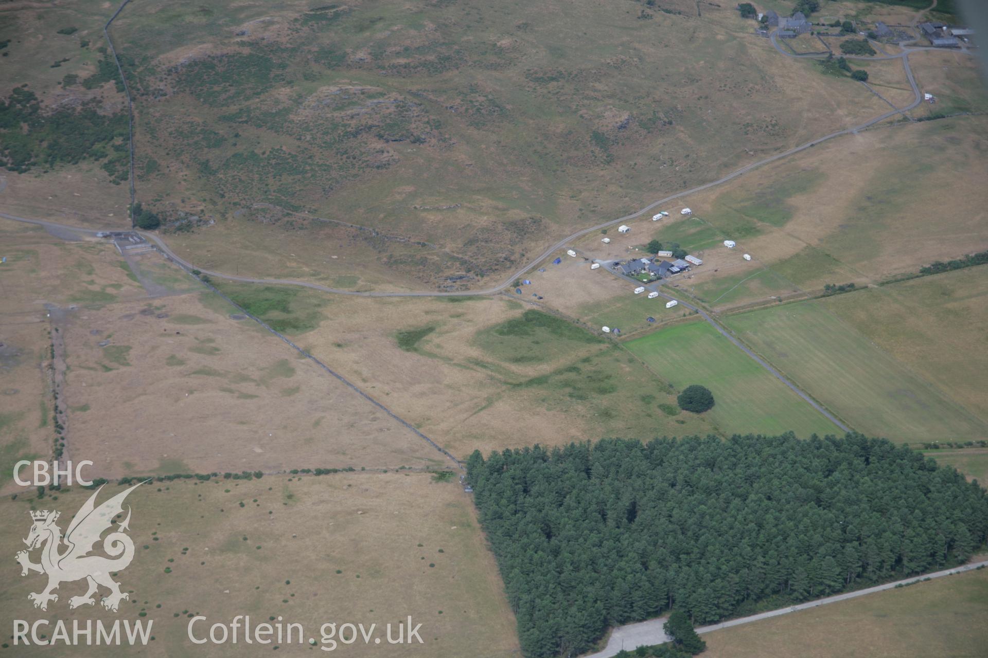 RCAHMW colour oblique aerial photograph of Tanforhesgan Enclosure. Taken on 25 July 2006 by Toby Driver.
