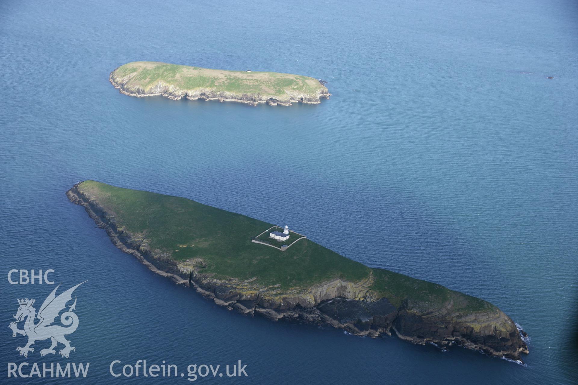 RCAHMW colour oblique aerial photograph of St Tudwall's Lighthouse from the south-west. Taken on 09 February 2006 by Toby Driver.