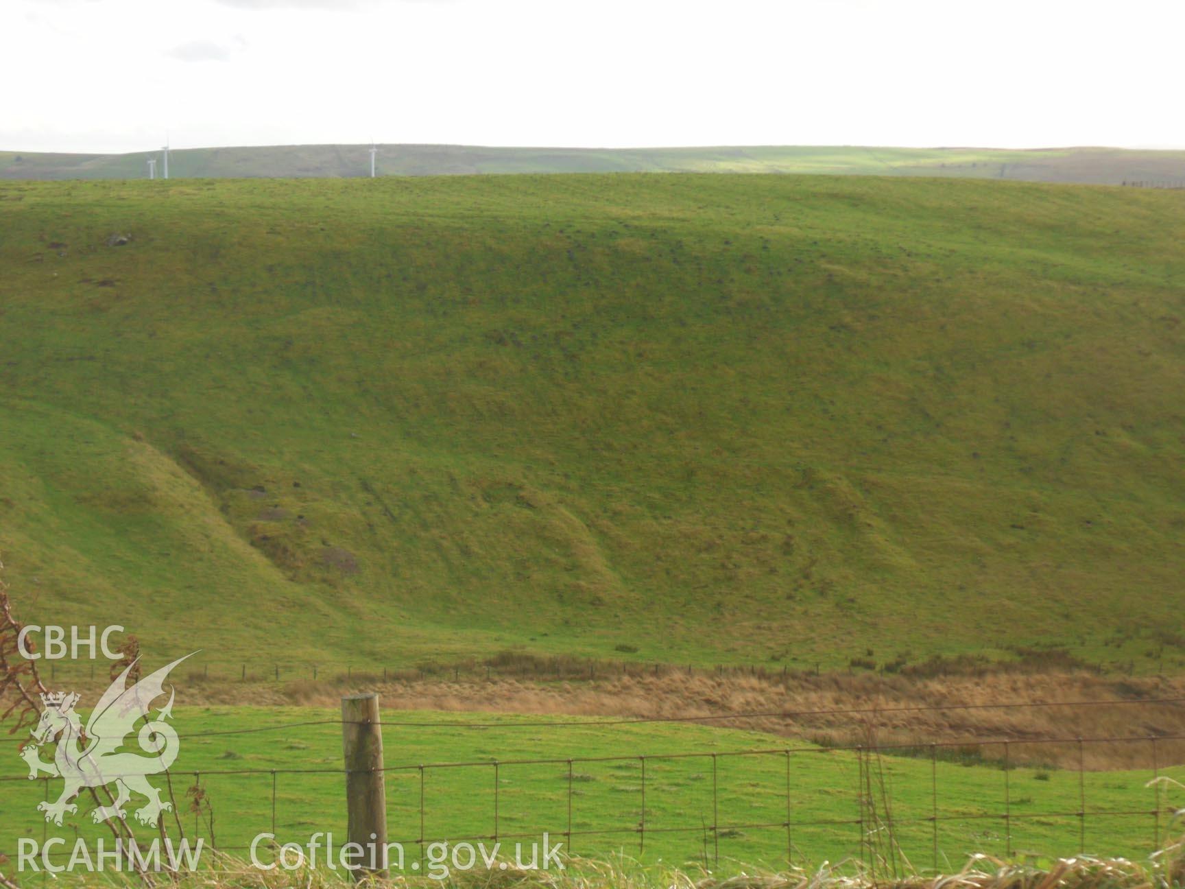 Digital colour photograph showing view south from northern extent of assessment area showing Pillow Mounds on north facing slope within assessment area, Tan y Foel Quarry, Cefn Coch, report no. 1089.
