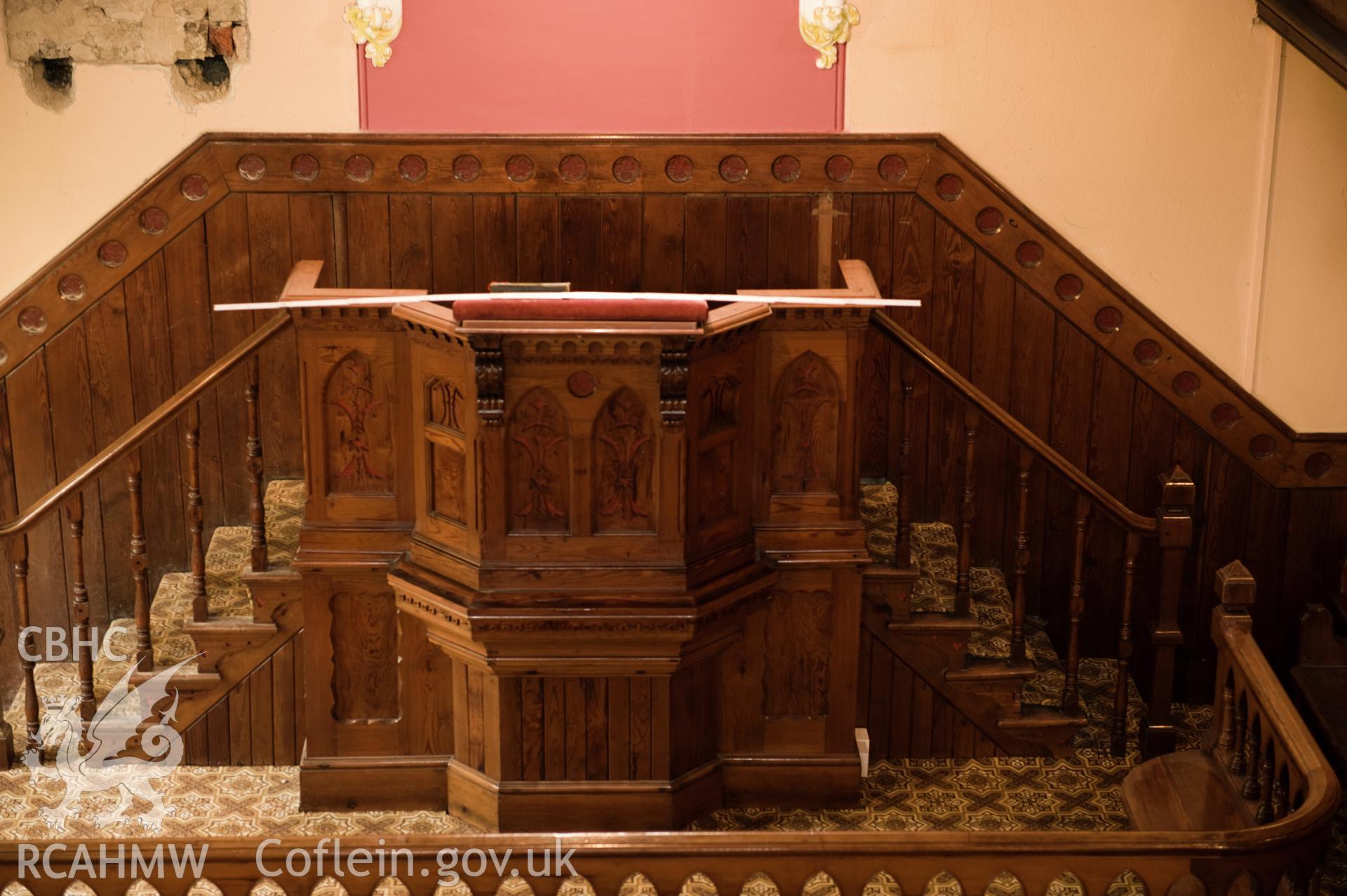 Digital image of interior with rule guide: close-up of pulpit, from first floor perspective.