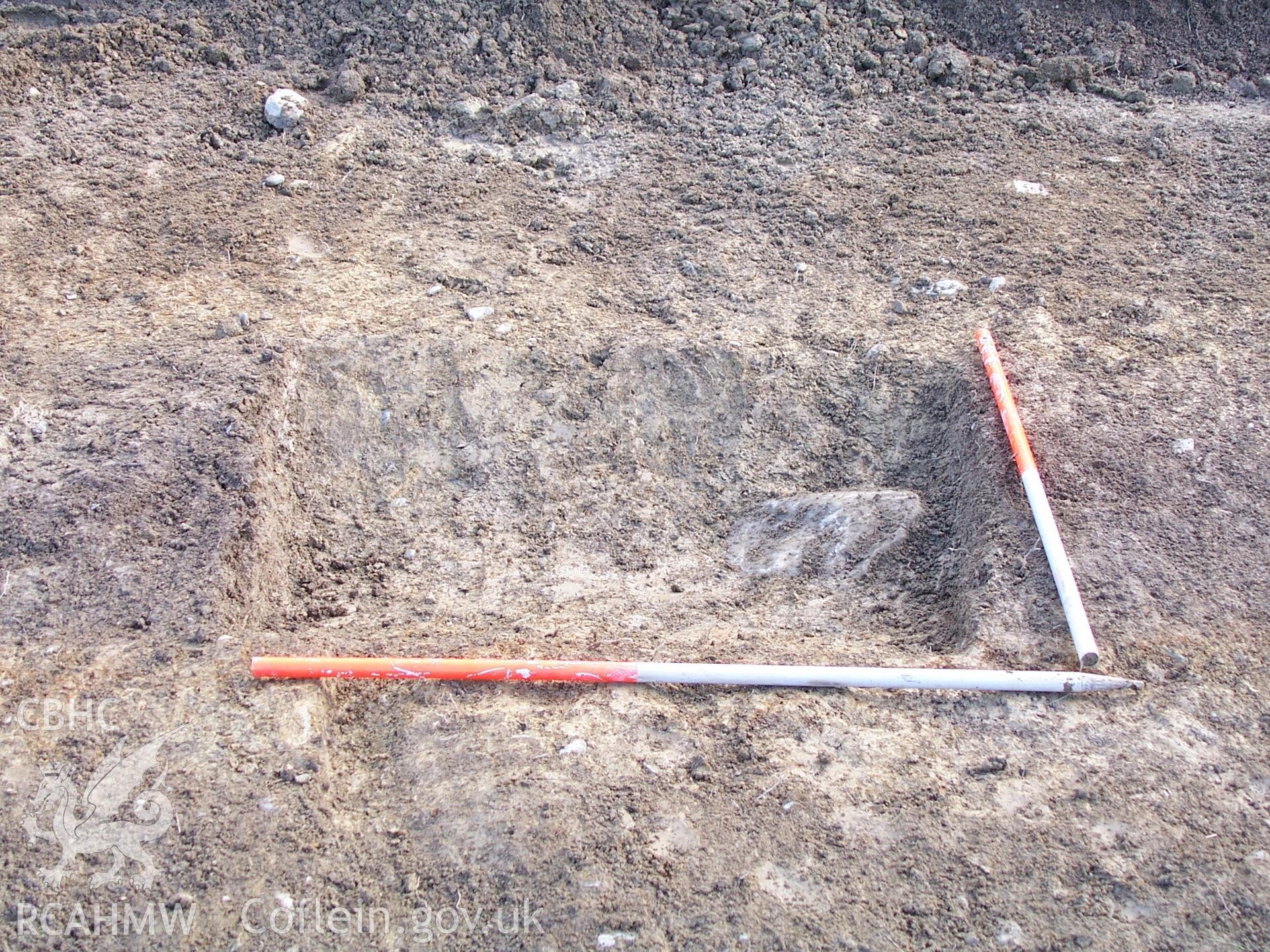 Photograph from an archaeological observation on Newbridge Sawmill, Newbridge, Monmouthshire, area 2 view of east excavated section of linear feature. Produced by Border Archaeology in February 2006.