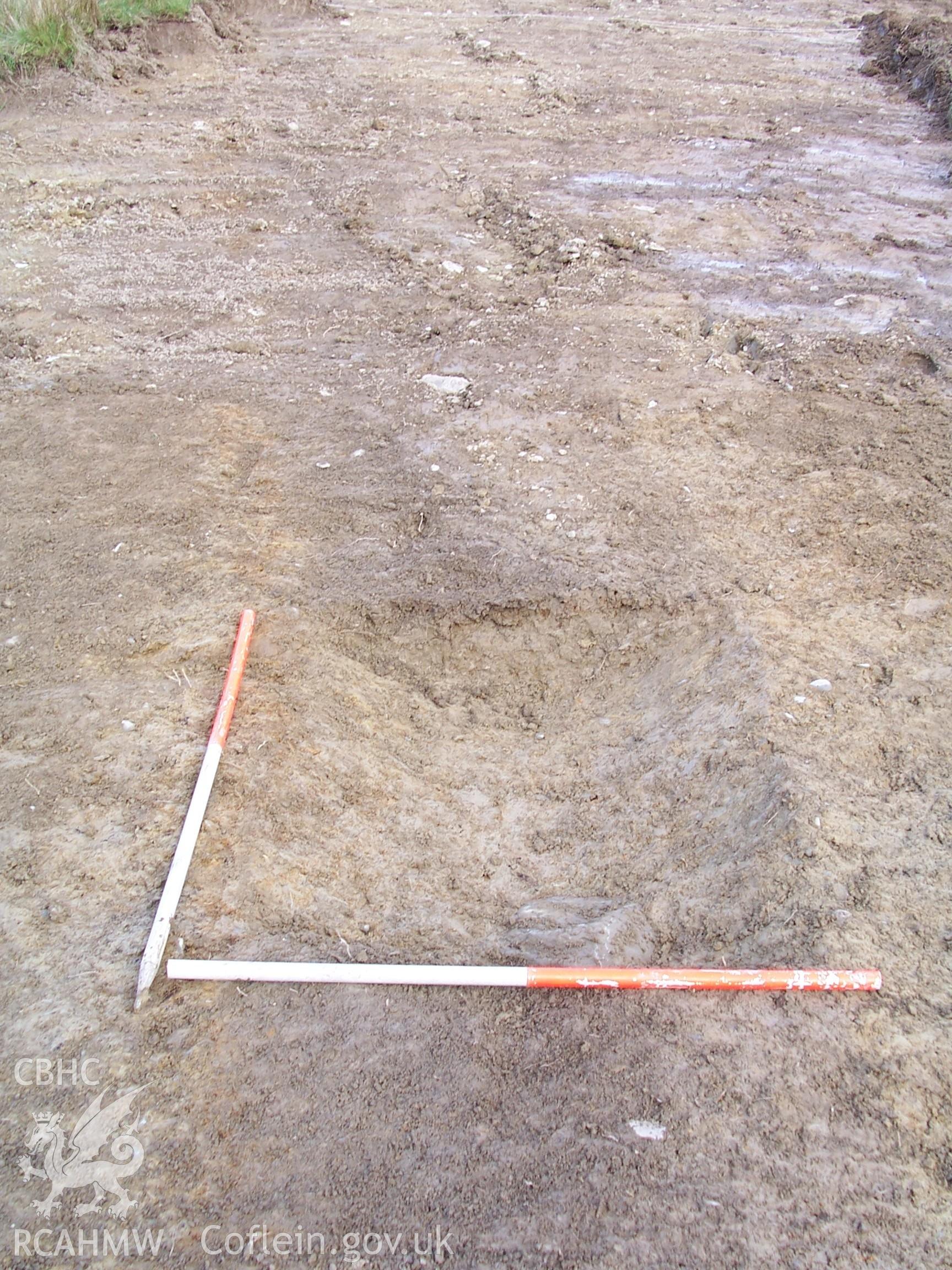 Photograph from an archaeological observation on Newbridge Sawmill, Newbridge, Monmouthshire, area 2 view of north excavated section of linear feature. Produced by Border Archaeology in February 2006.