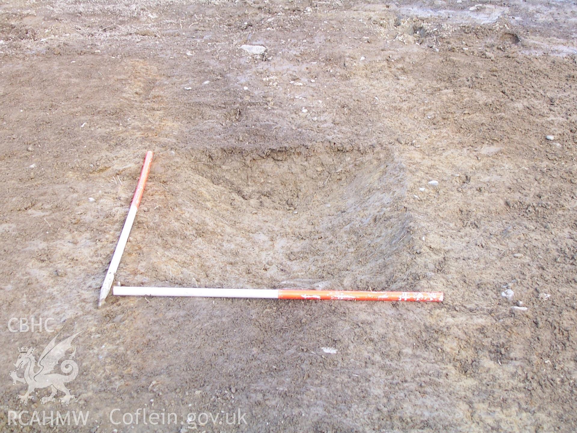 Photograph from an archaeological observation on Newbridge Sawmill, Newbridge, Monmouthshire, view of north excavated section of linear feature. Produced by Border Archaeology in February 2006.