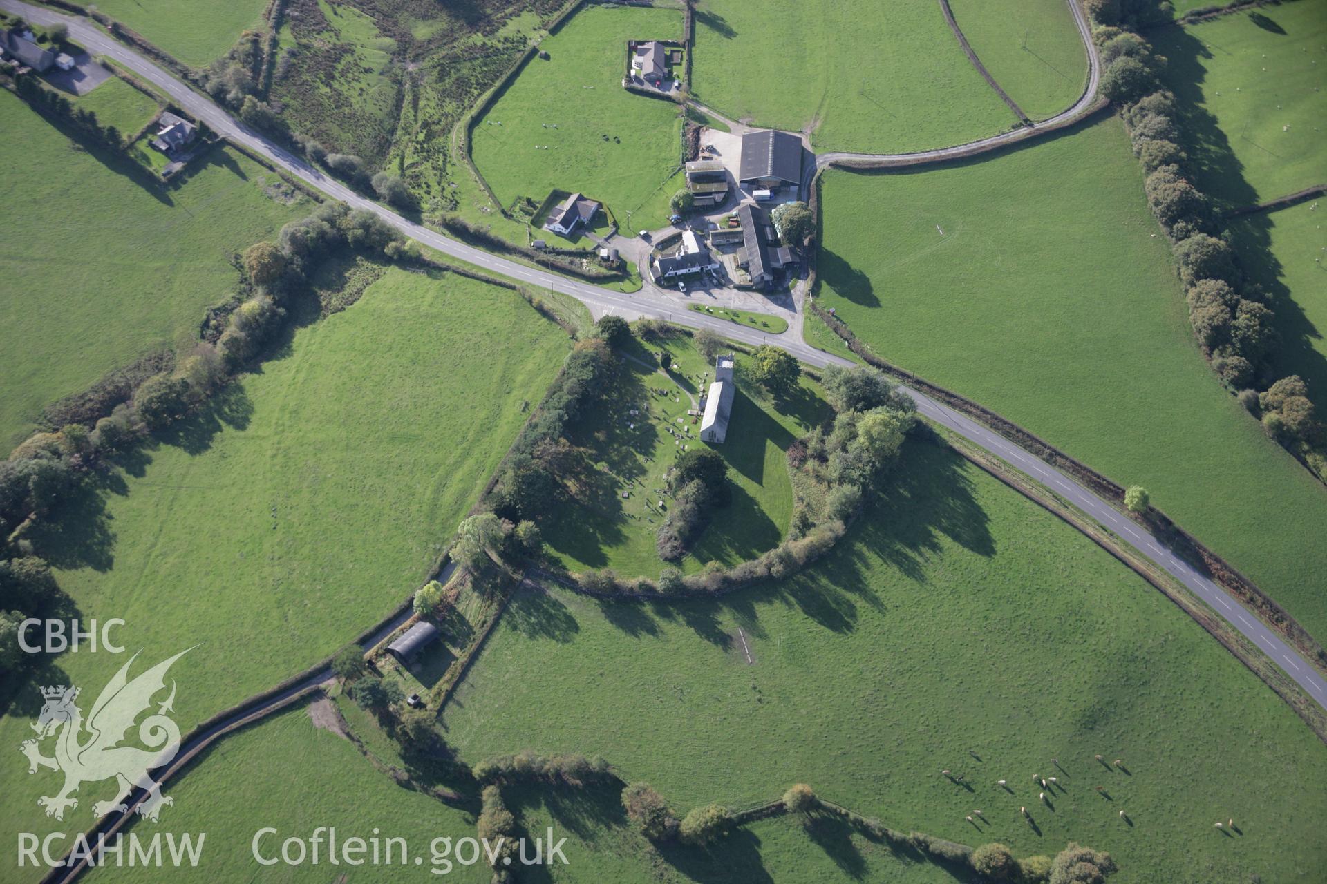 RCAHMW colour oblique aerial photograph of Llanafan Fawr showing the village and church, viewed from the north-east Taken on 13 October 2005 by Toby Driver