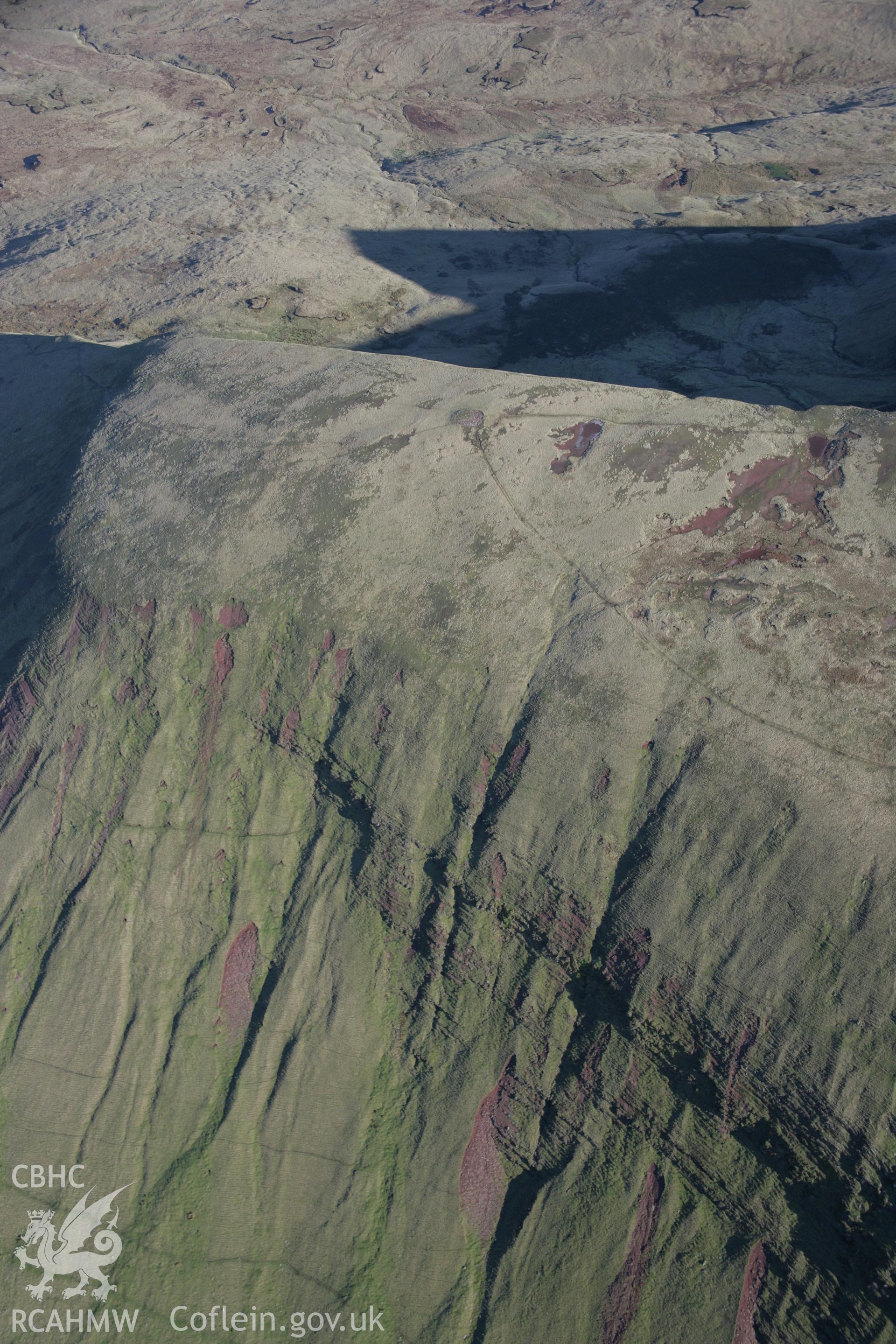 RCAHMW colour oblique photograph of Fan Foel, Bronze Age cairn, view looking east. Taken by Toby Driver on 17/11/2005.