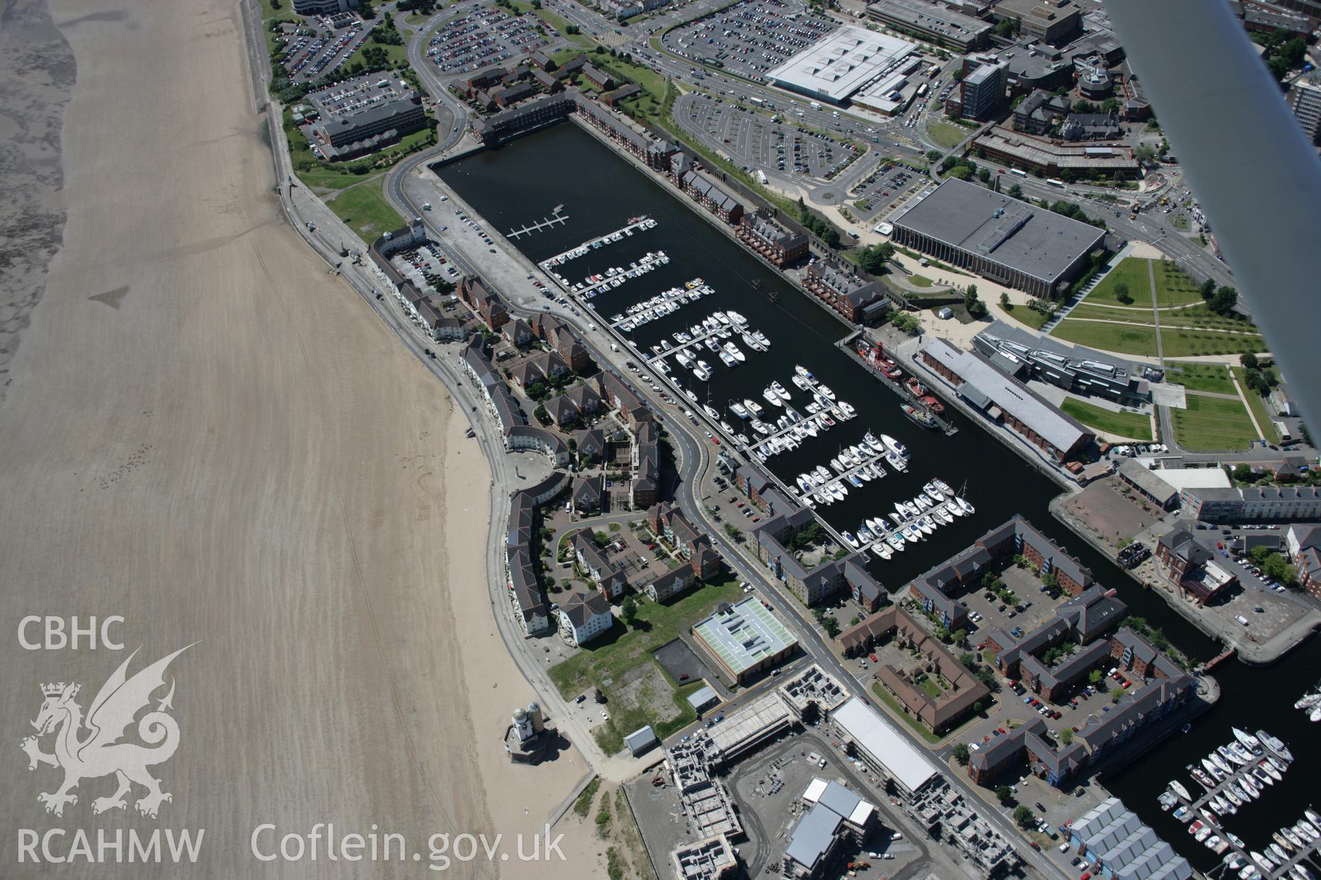 RCAHMW colour oblique aerial photograph of South Dock, now Swansea Marina, from the south-east. Taken on 22 June 2005 by Toby Driver