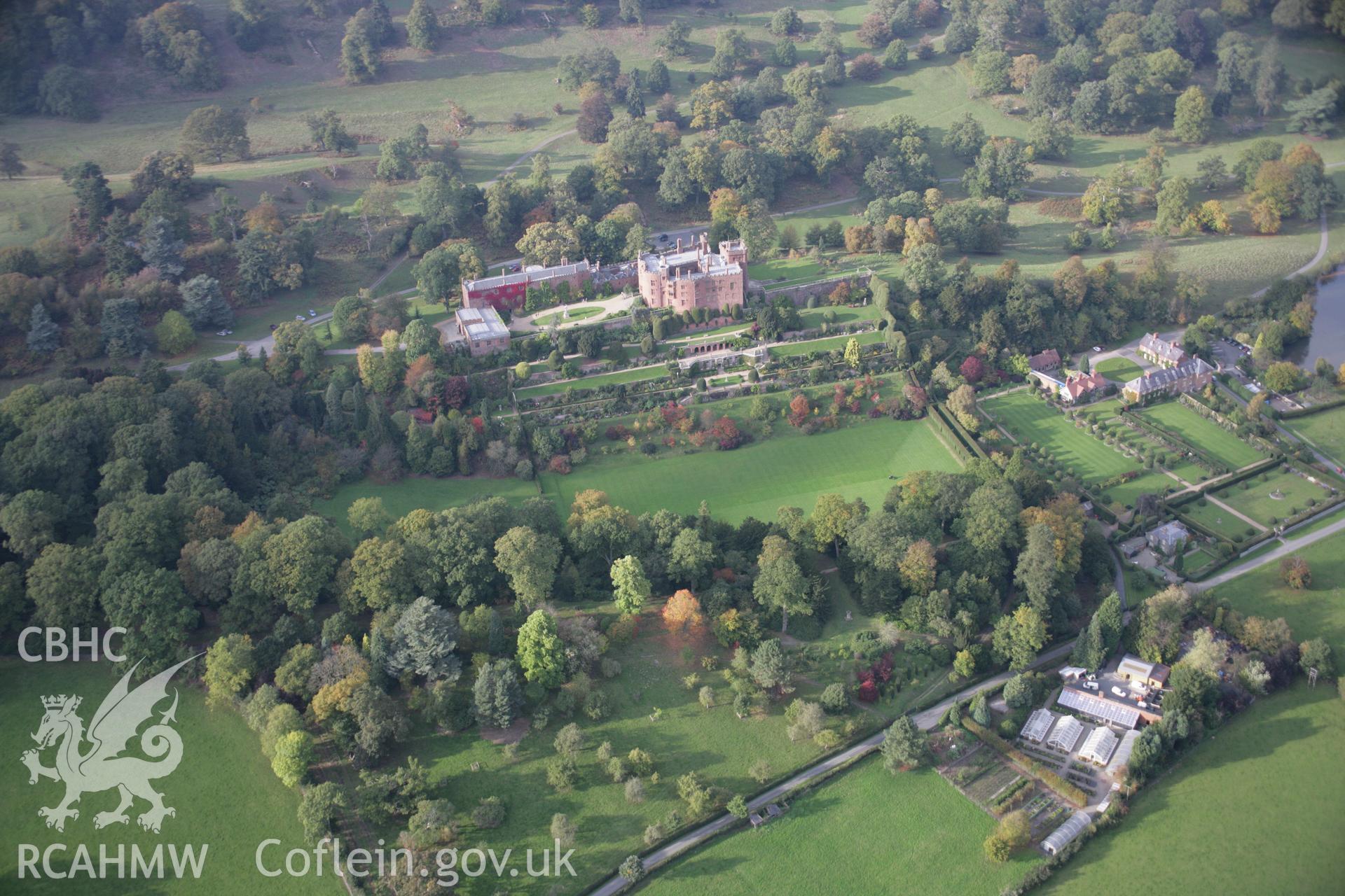 RCAHMW colour oblique aerial photograph of Powis Castle, also showing the gardens in autumn colour, from the south-east. Taken on 17 October 2005 by Toby Driver