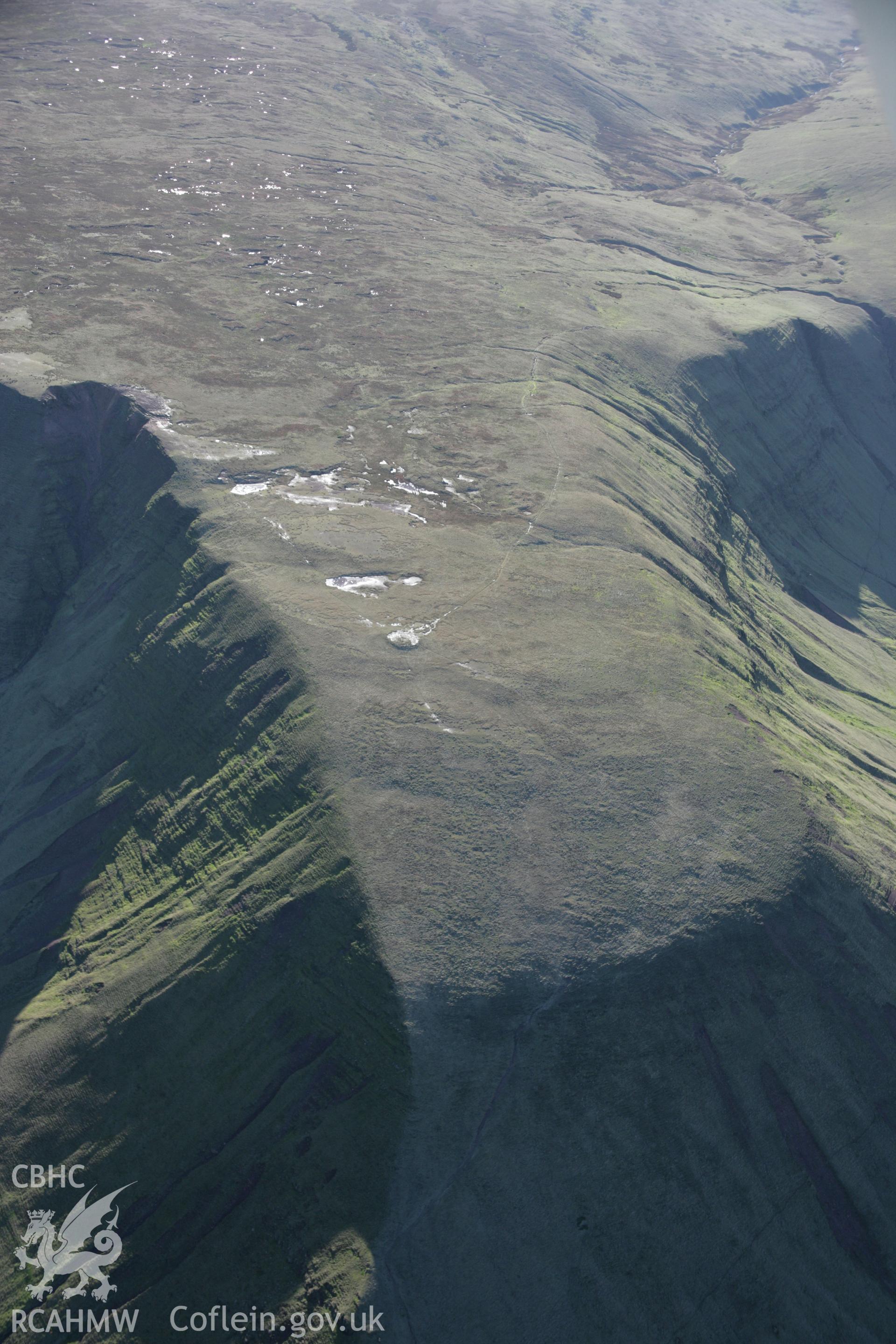 RCAHMW colour oblique photograph of Fan Foel, Bronze Age cairn, view looking south. Taken by Toby Driver on 17/11/2005.