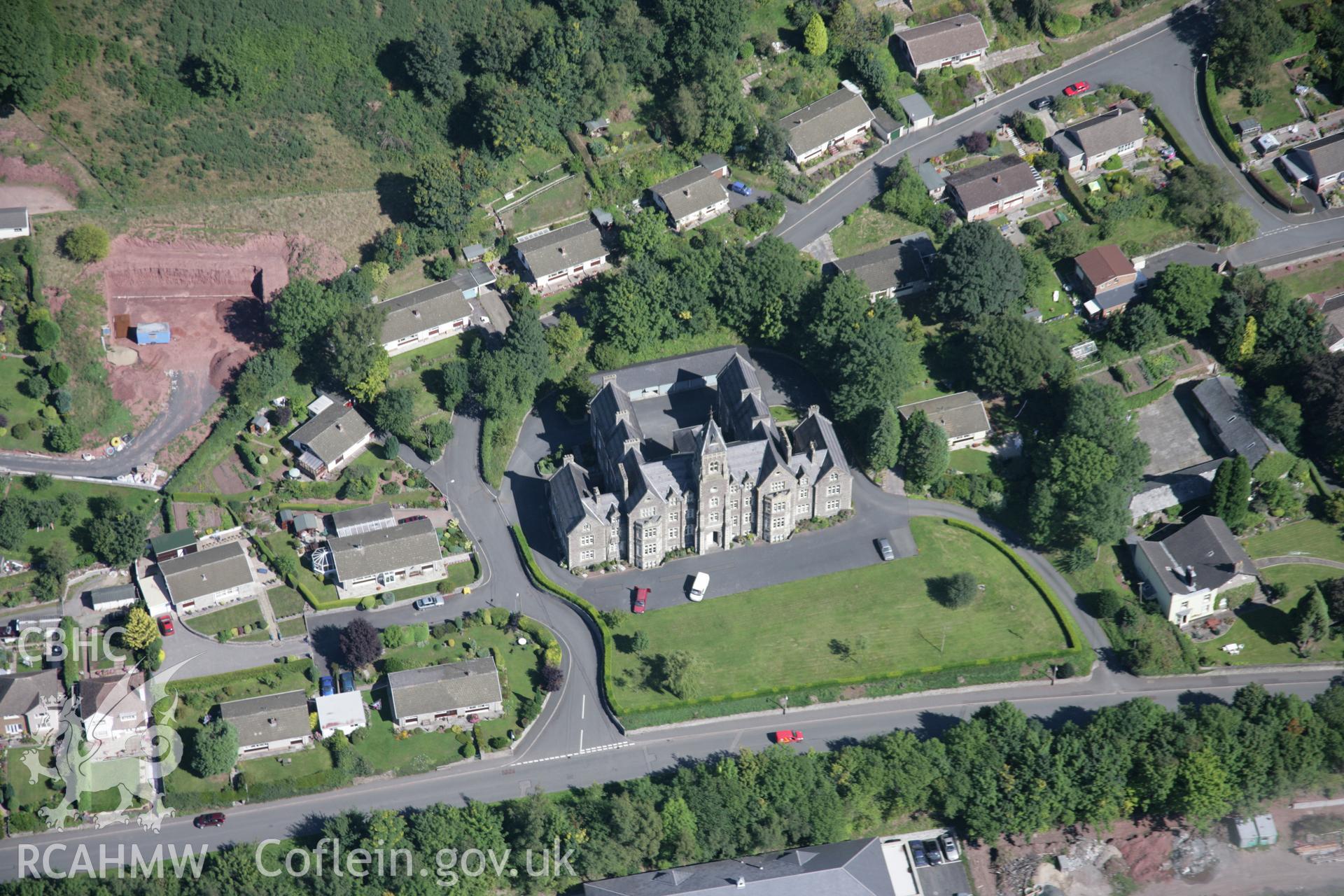 RCAHMW colour oblique aerial photograph of Congregational Memorial College (Camden Court), Camden Road, Brecon. Taken on 02 September 2005 by Toby Driver