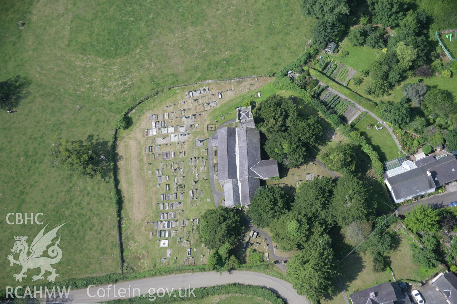 RCAHMW colour oblique aerial photograph of St Cathen's Church, Llangathen. Taken on 11 July 2005 by Toby Driver