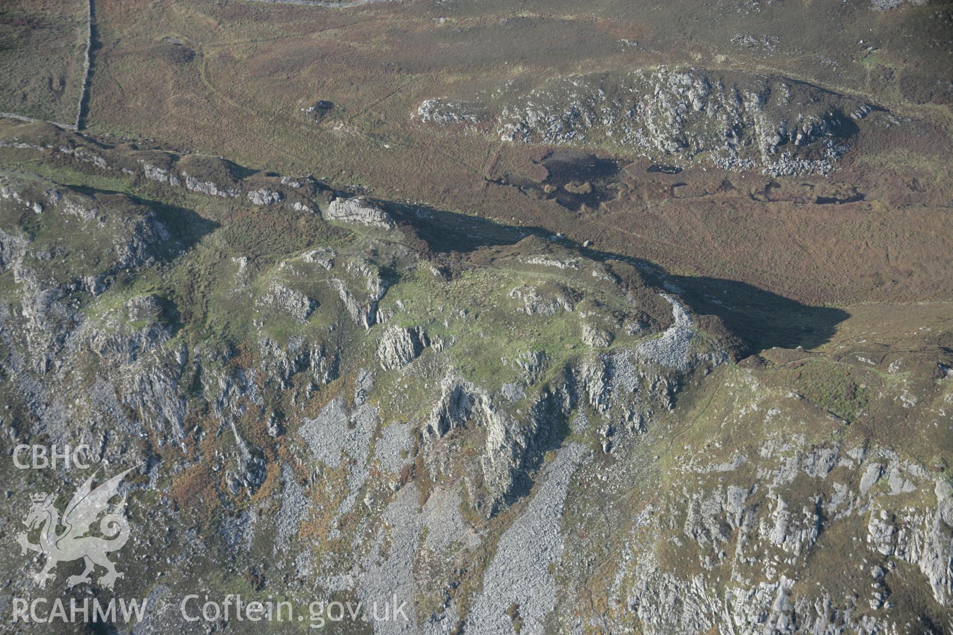 RCAHMW colour oblique aerial photograph of Pared-y-Cefn Hir Hillfort, viewed looking towards the north-west. Taken on 17 October 2005 by Toby Driver