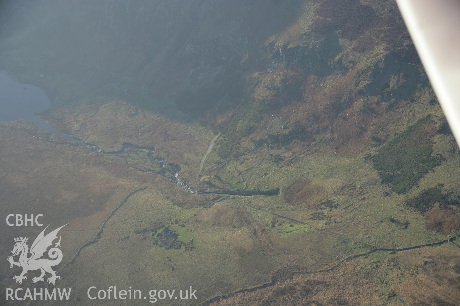 RCAHMW colour oblique aerial photograph of Clogwyn-Yr Eryr Farmstead from the east. Taken on 21 November 2005 by Toby Driver