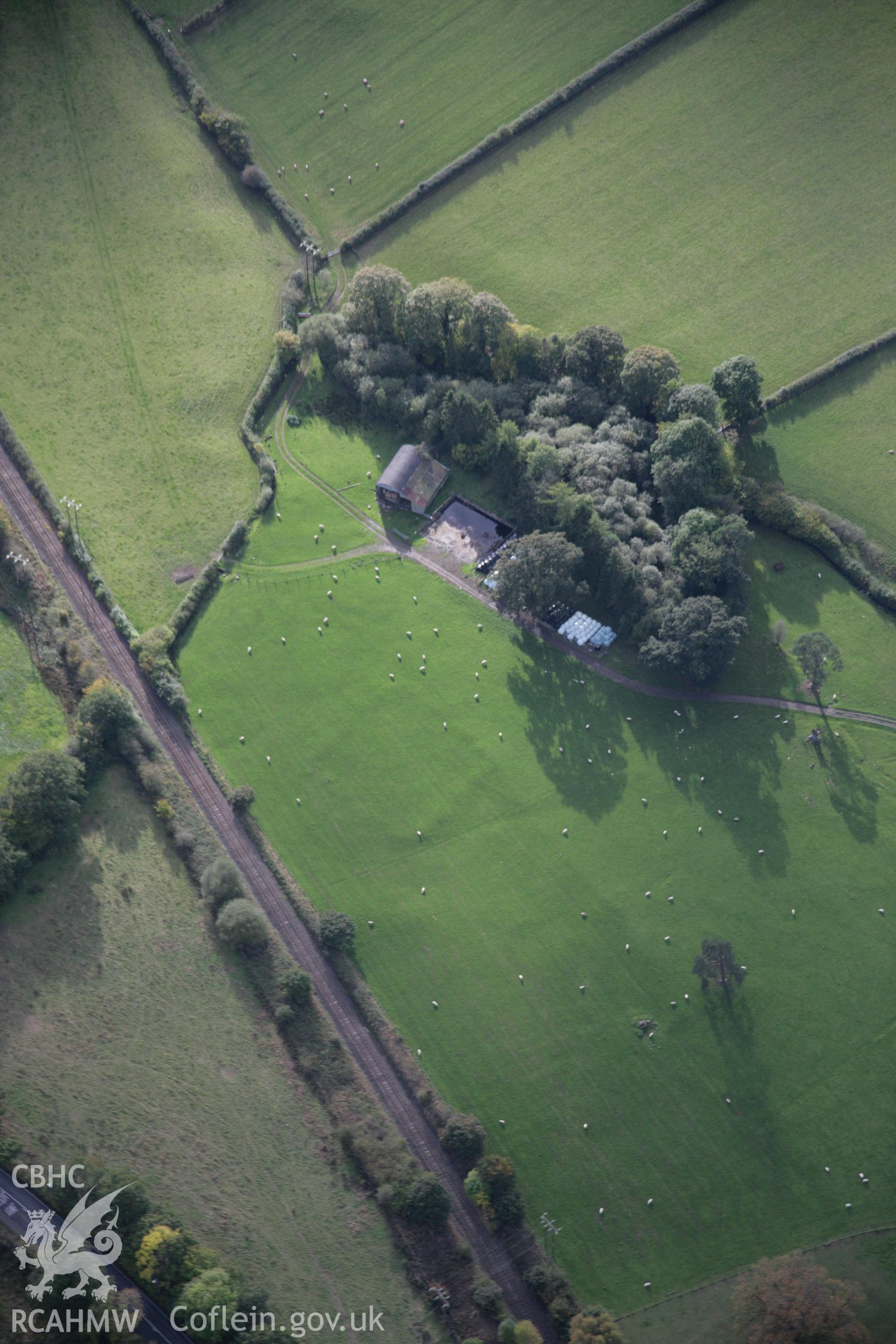 RCAHMW colour oblique aerial photograph of Llandrindod Common Howie Roman Camp XIX, viewed from the north-east. Taken on 13 October 2005 by Toby Driver