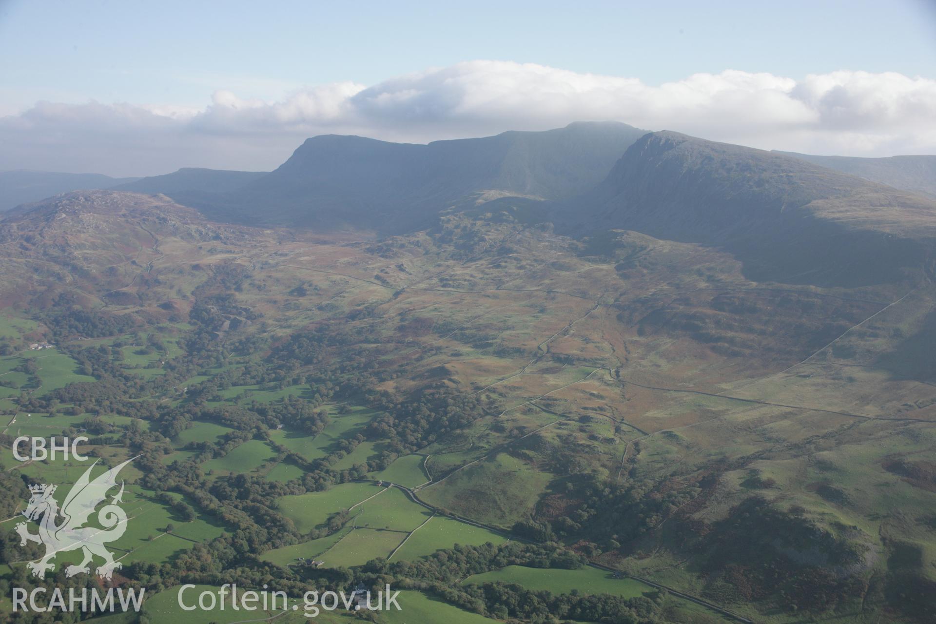 RCAHMW colour oblique aerial photograph of Cadair Idris. A wide landscape view looking south-east. Taken on 17 October 2005 by Toby Driver
