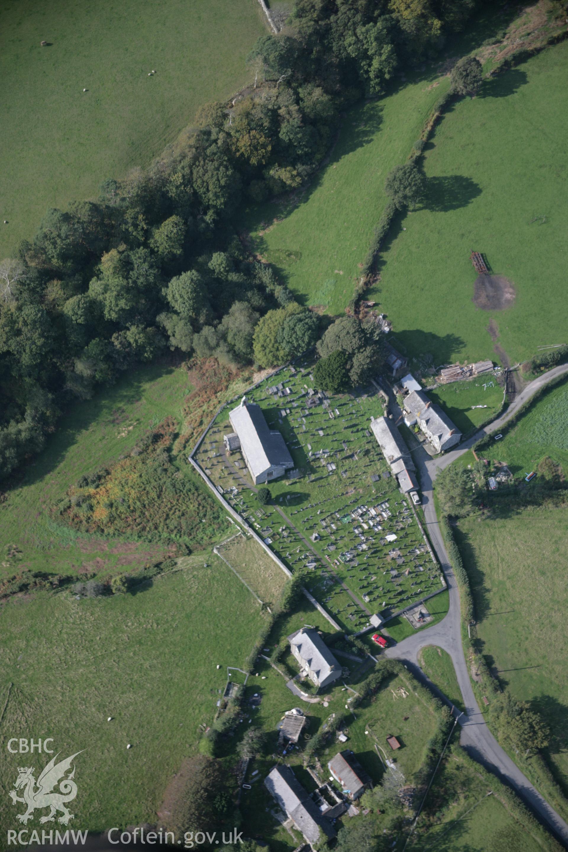 RCAHMW colour oblique aerial photograph of St Mary and St Egryn's Church, Llanegryn, from the south-east. Taken on 17 October 2005 by Toby Driver