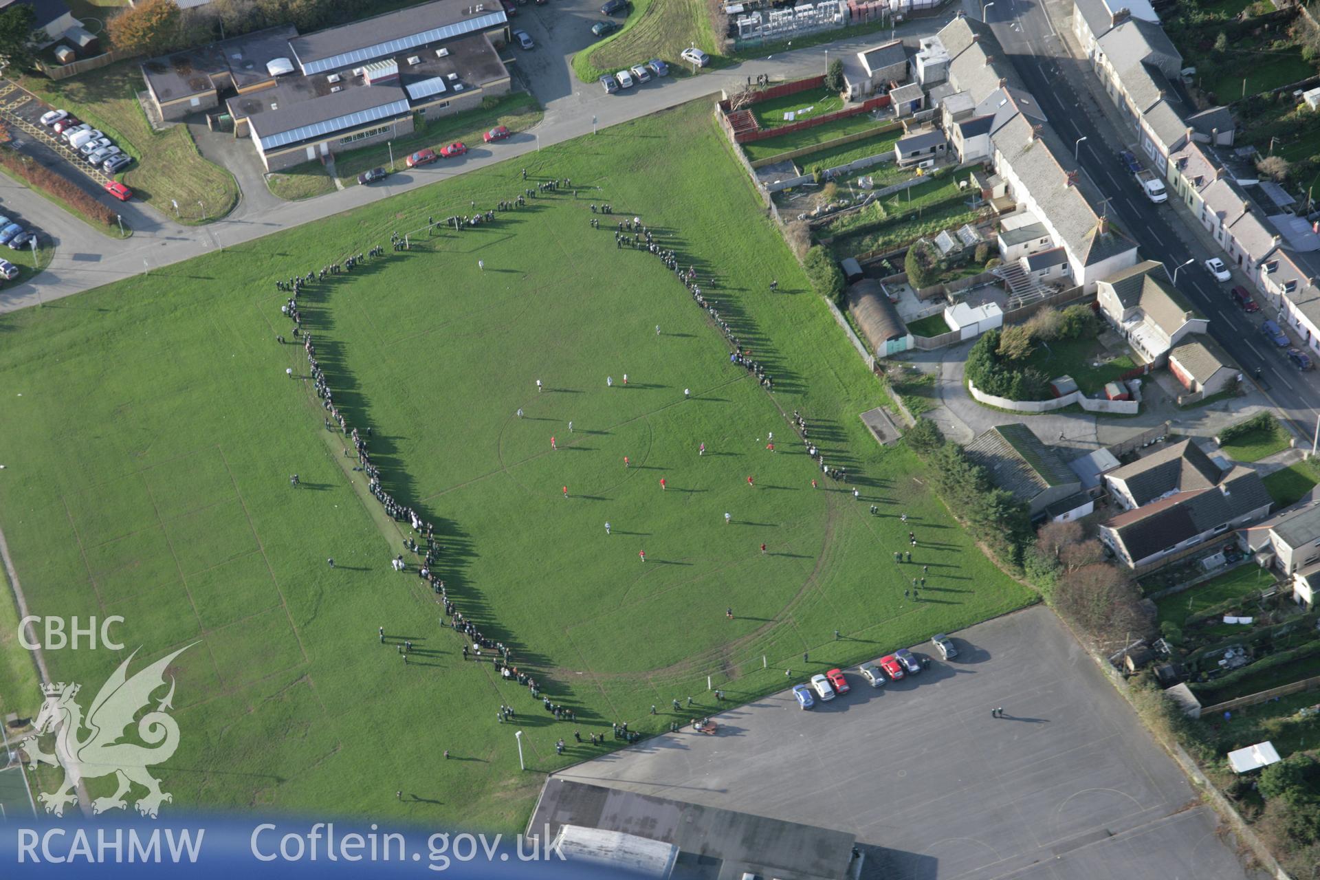 RCAHMW colour oblique photograph of Haverfordwest, Tasker School, view of playing field during football match, looking north-west. Taken by Toby Driver on 17/11/2005.