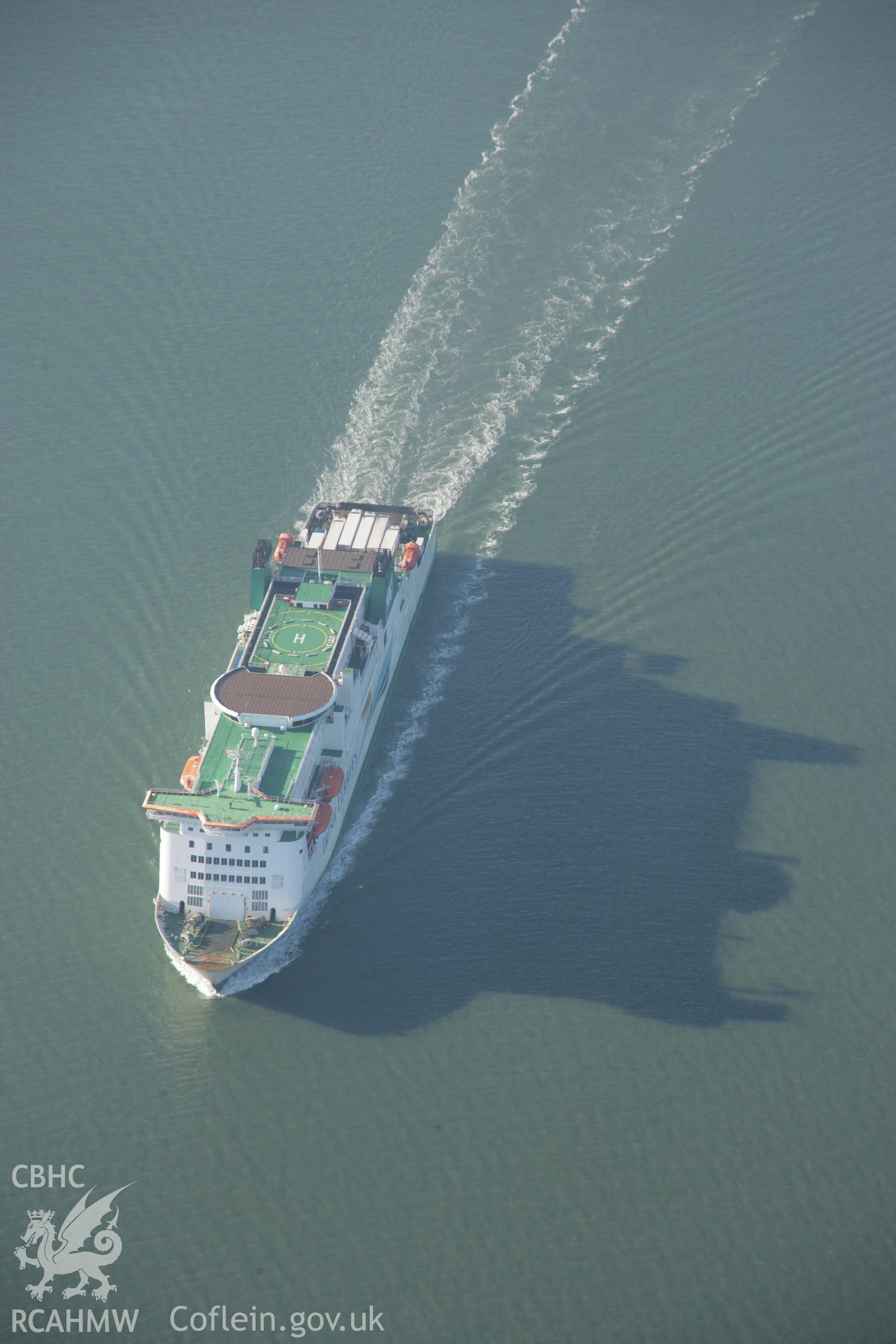 RCAHMW colour oblique aerial photograph of the west jetty at South Hook Point, Milford Haven, from the east showing an Irish Sea Ferry. Taken on 19 November 2005 by Toby Driver