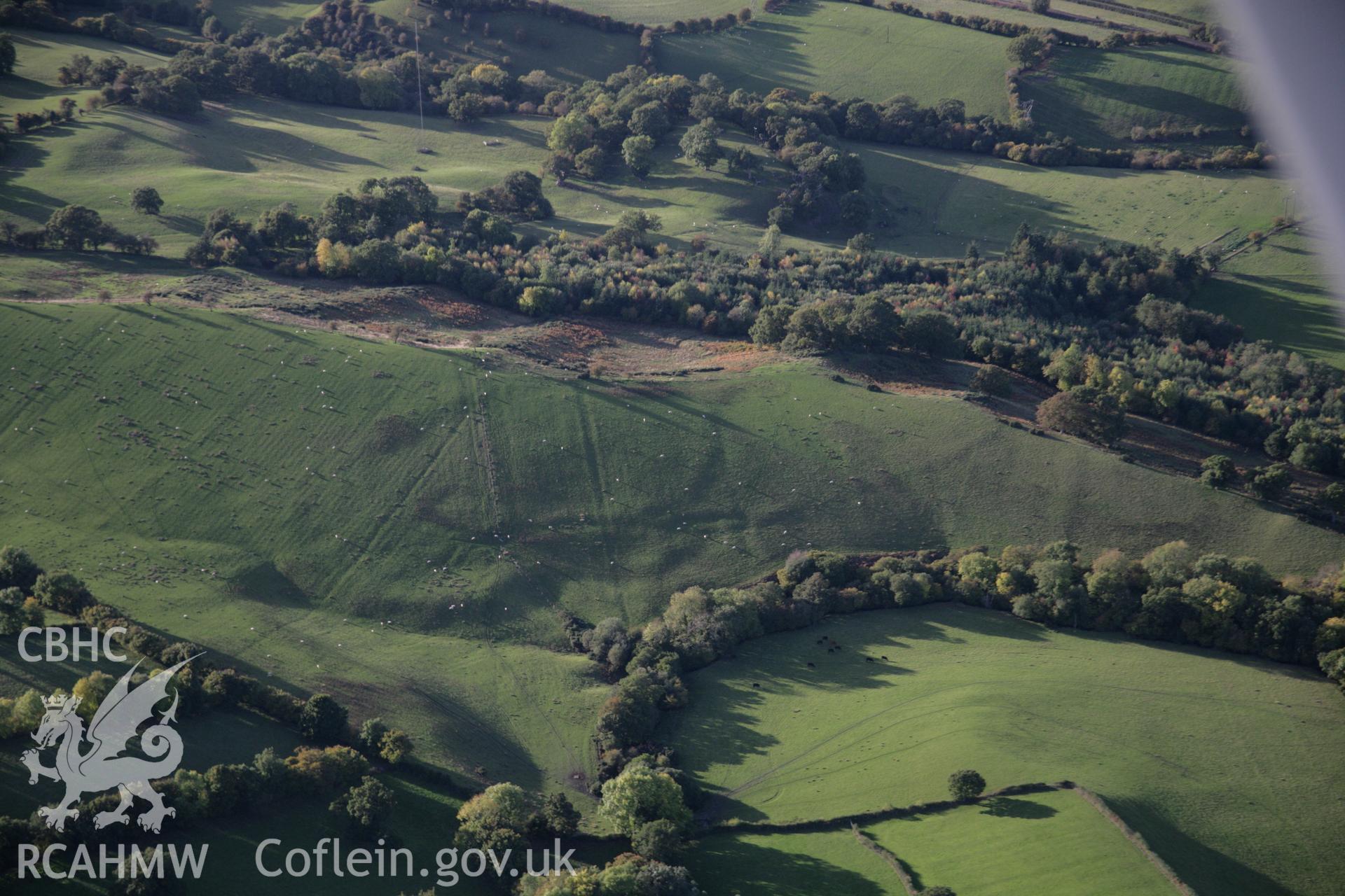 RCAHMW colour oblique photograph of unlocated earthworks. Taken by Toby Driver on 13/10/2005.