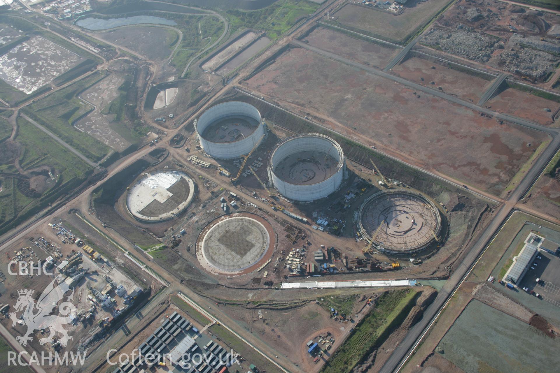 RCAHMW colour oblique aerial photograph of Esso South Hook Oil Refinery and liquid natural gas facility, Milford Haven, under construction from the north-east. Taken on 19 November 2005 by Toby Driver