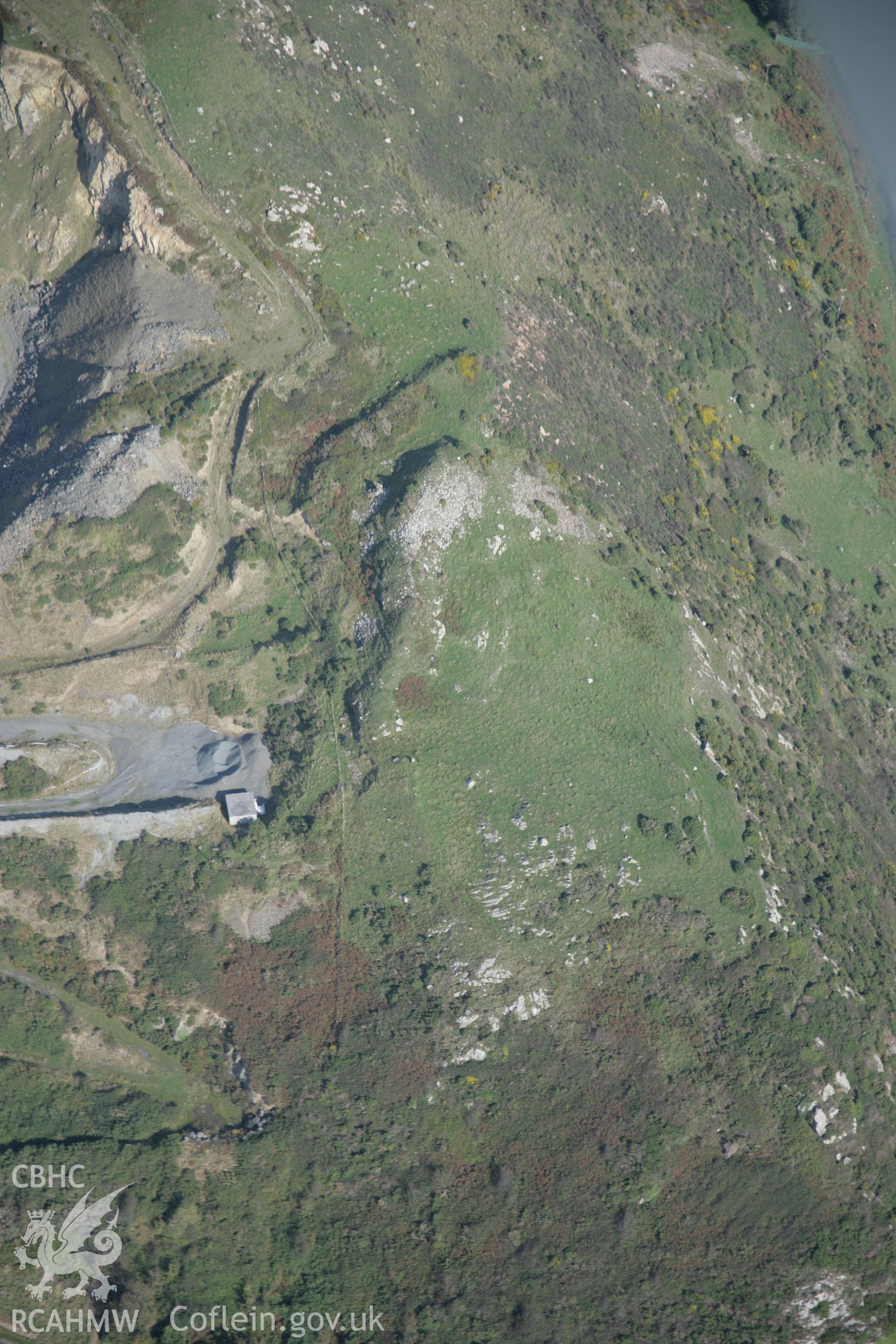 RCAHMW colour oblique aerial photograph of Tal-y-Gareg  Hill Fort from the west. Taken on 17 October 2005 by Toby Driver