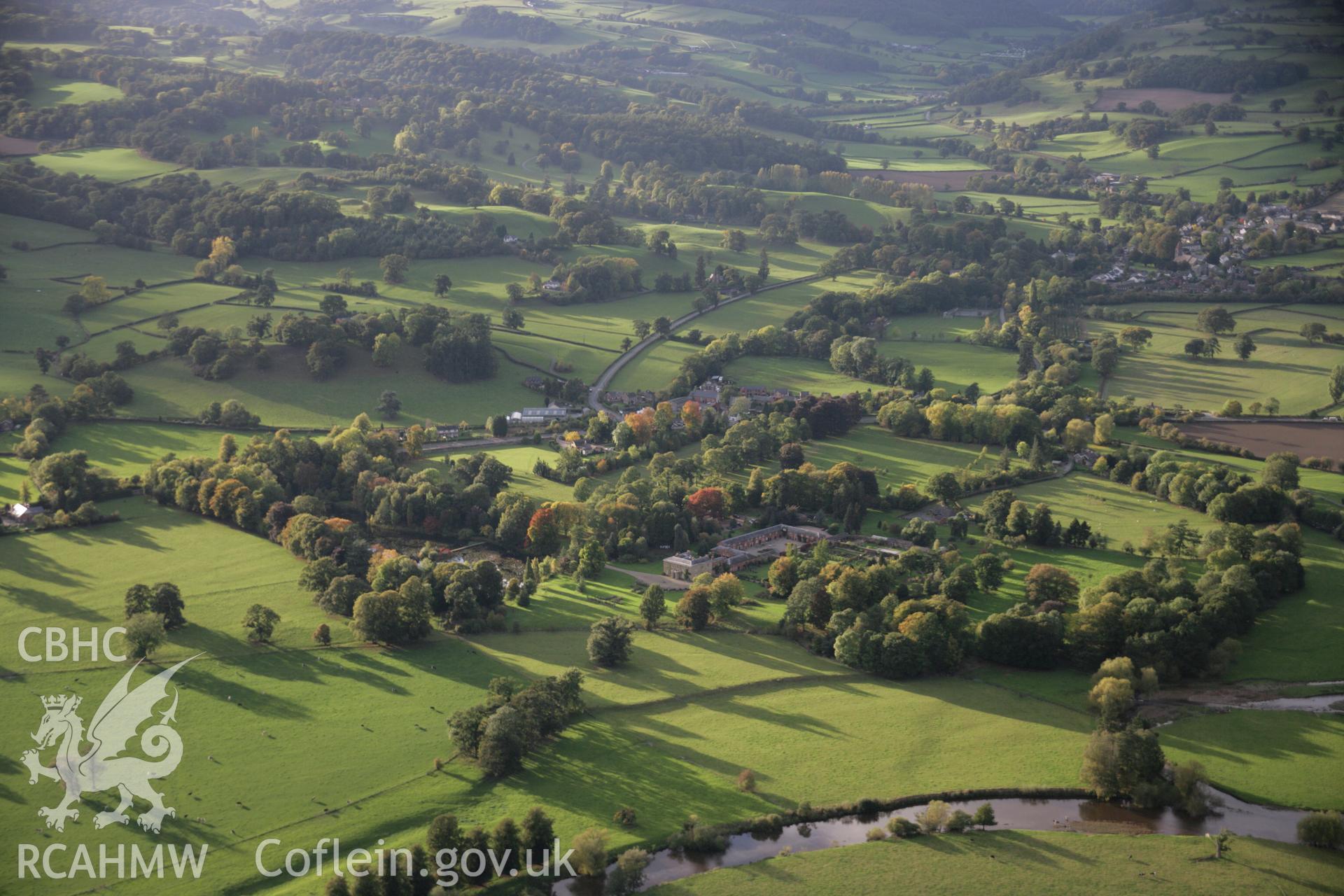 RCAHMW colour oblique aerial photograph of Glansevern Hall Garden, Berriew, with autumn colours, from the east. Taken on 13 October 2005 by Toby Driver