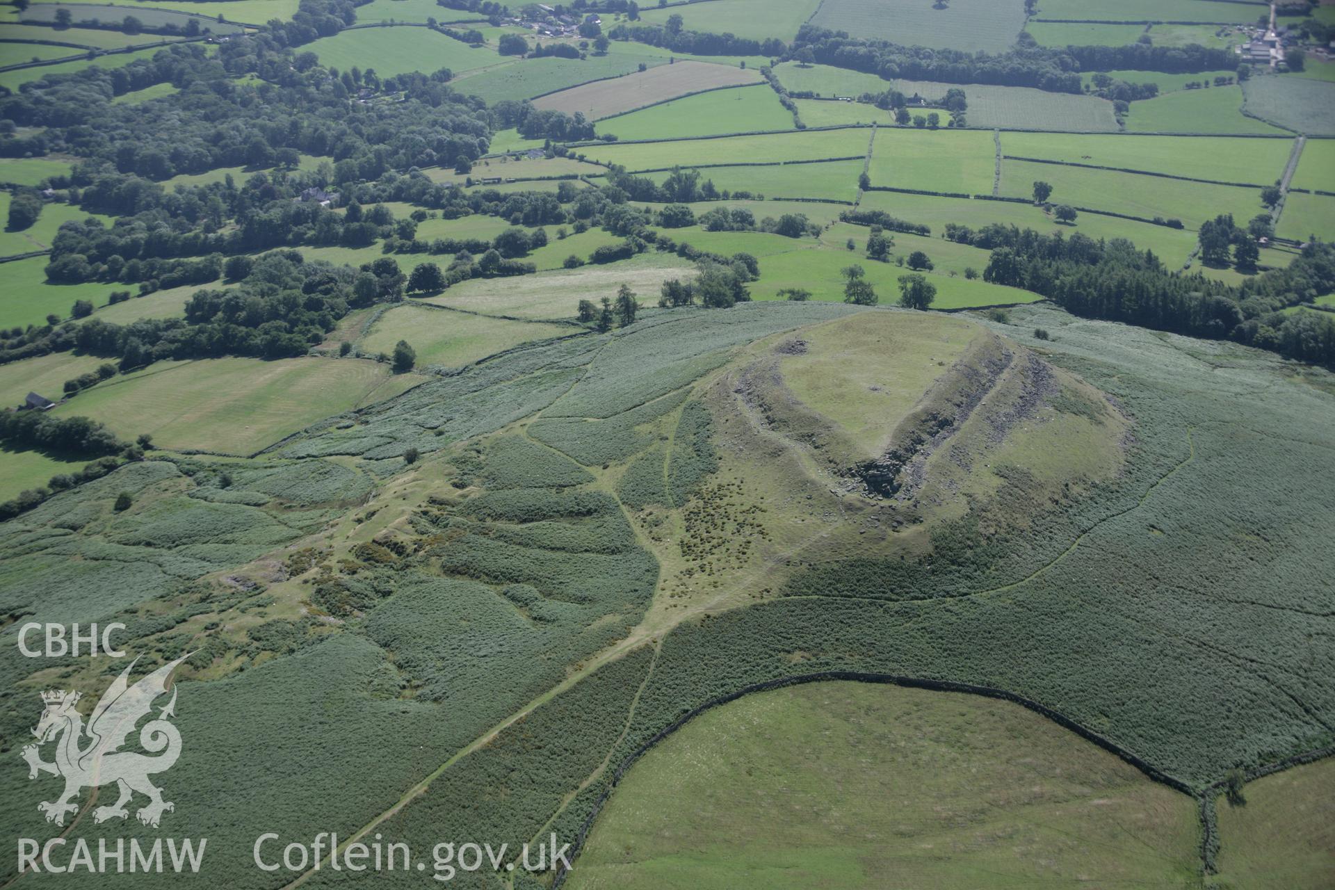 RCAHMW digital colour oblique photograph of Crug Hywel Hillfort viewed from the north. Taken on 02/09/2005 by T.G. Driver.