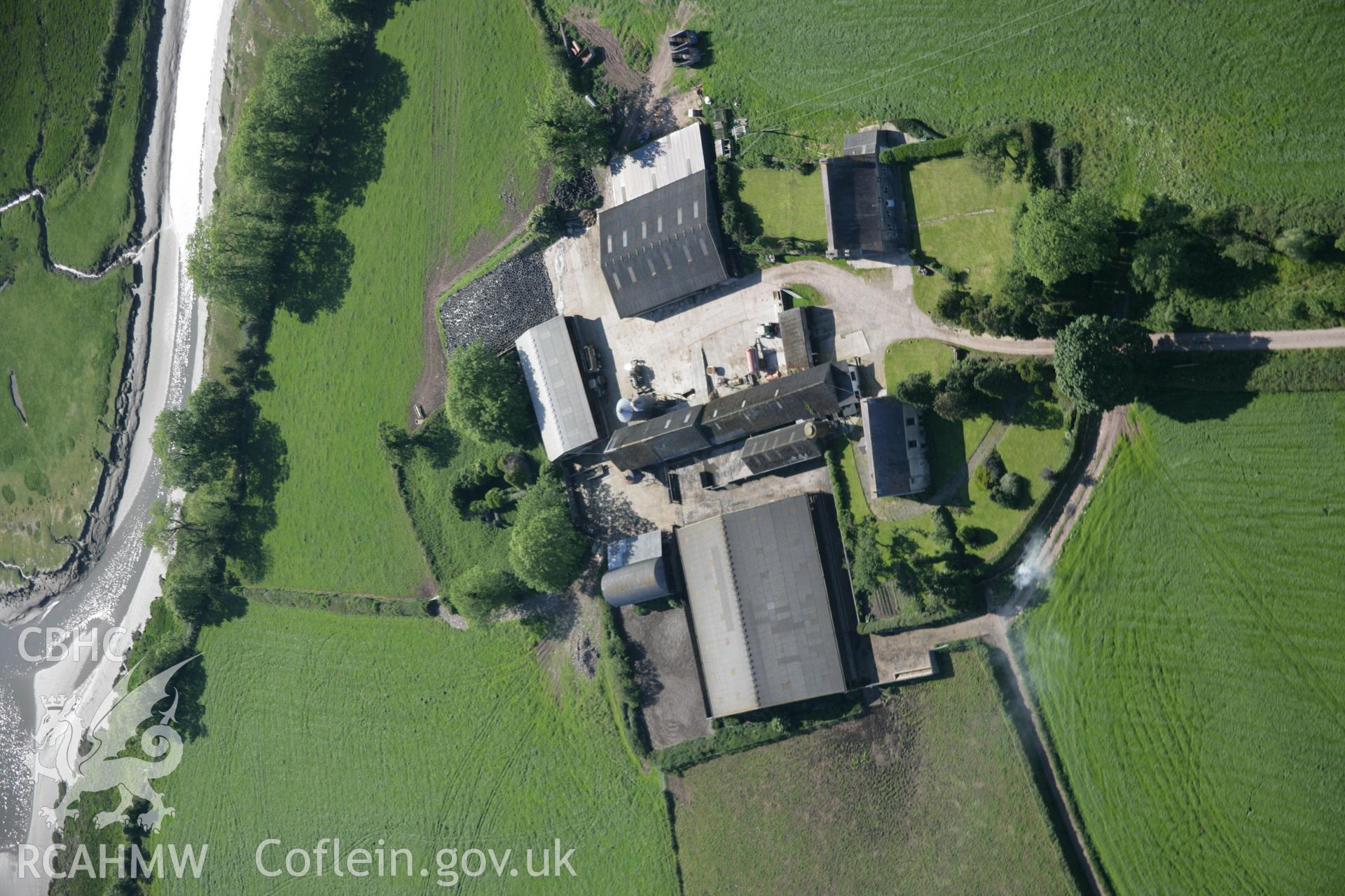 RCAHMW colour oblique aerial photograph of St Teilo's Church, Llandilo Abercowin, from the east. Taken on 09 June 2005 by Toby Driver