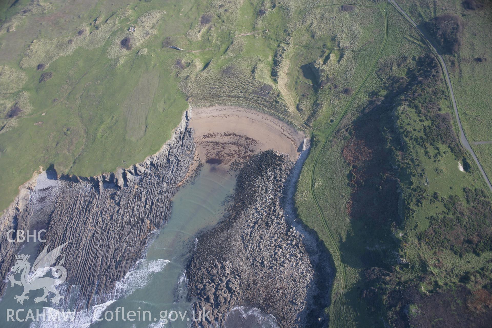 RCAHMW colour oblique aerial photograph of Linney Head Barrow and Blucks Pool, showing general view from the west. Taken on 19 November 2005 by Toby Driver