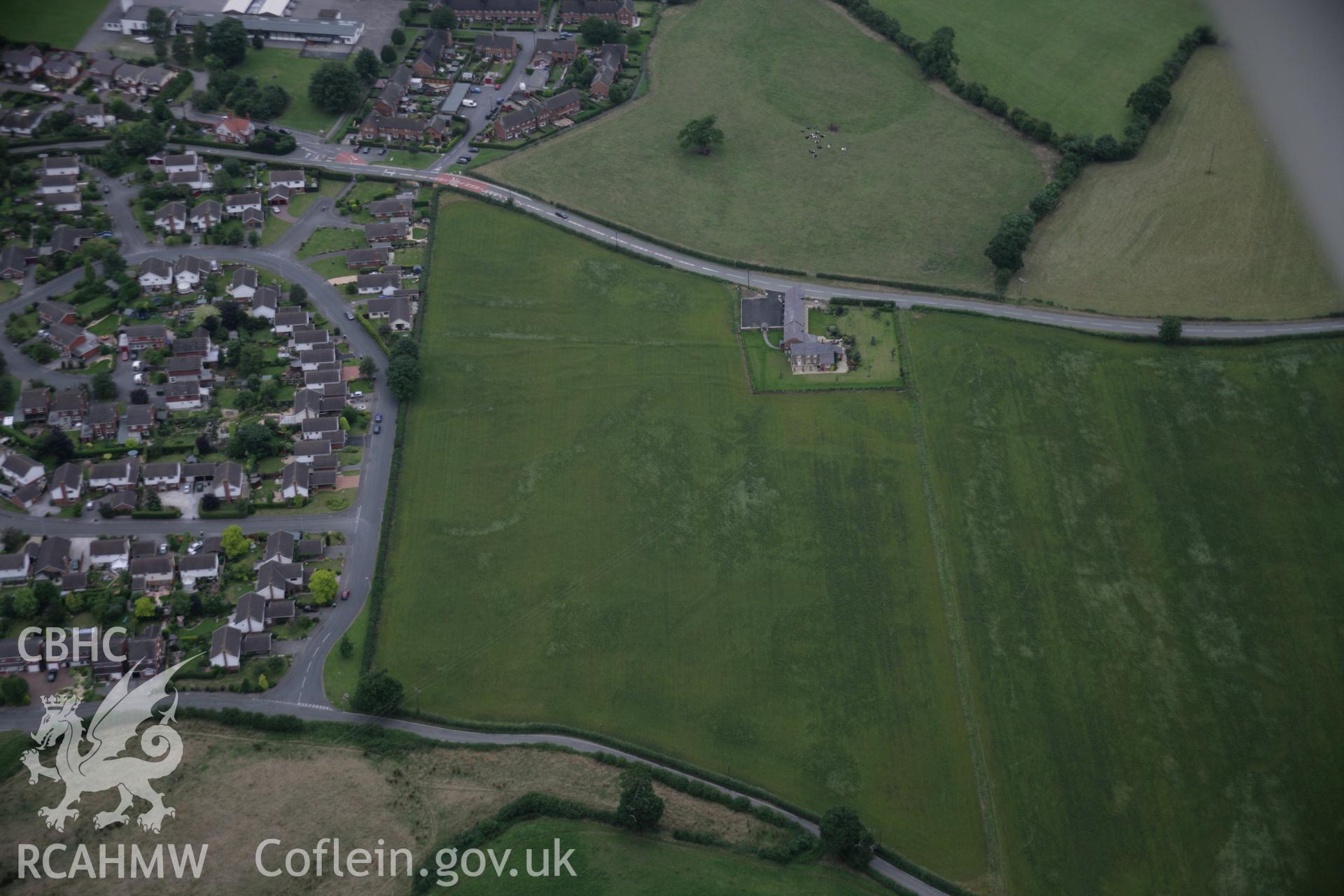 RCAHMW digital colour oblique photograph of Lane Farm, Rossett, viewed from the south. Taken on 01/08/2005 by T.G. Driver.