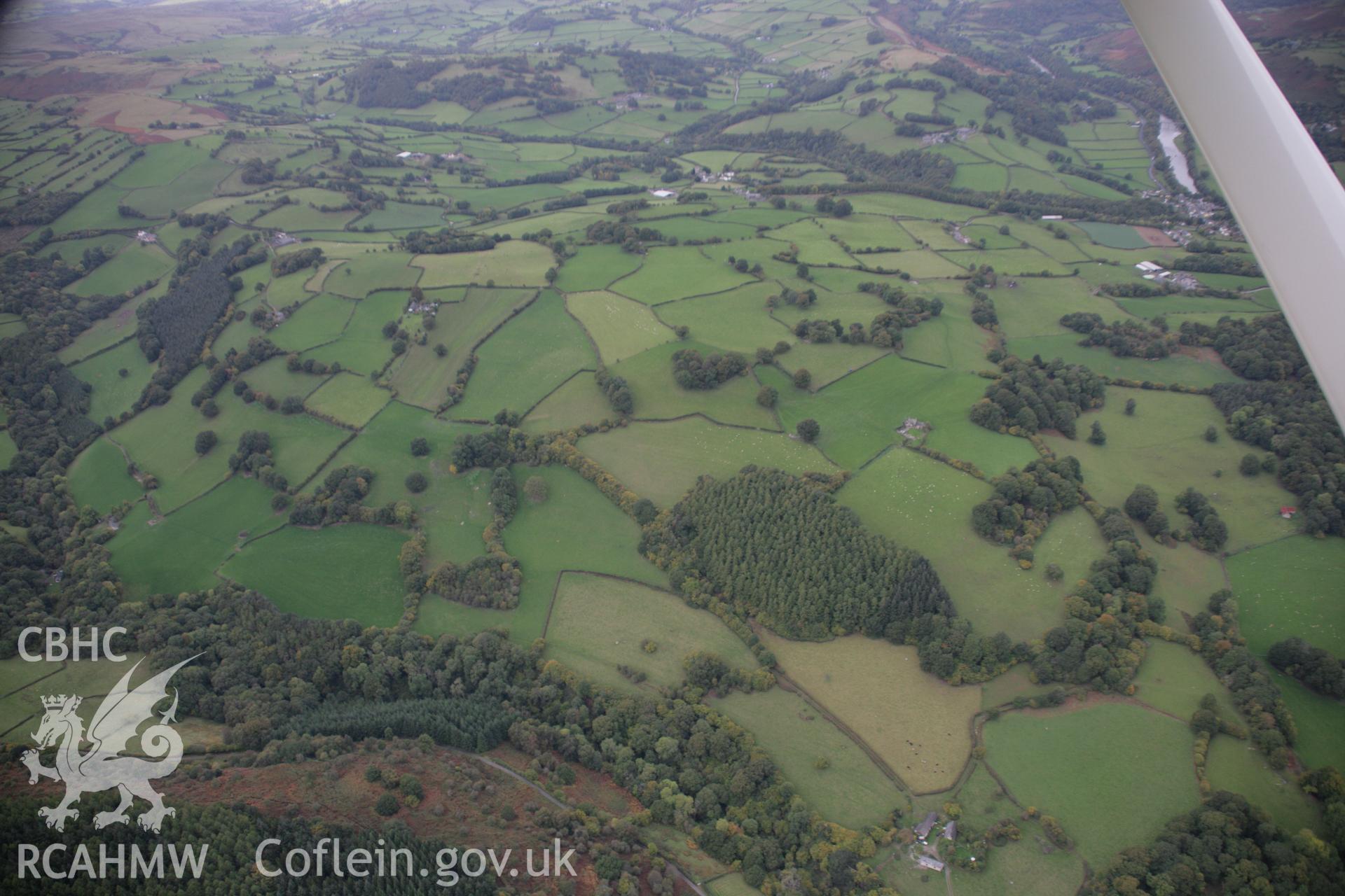 RCAHMW colour oblique aerial photograph of Hafodygarreg. A wide view of its hinterland from the south-east. Taken on 13 October 2005 by Toby Driver