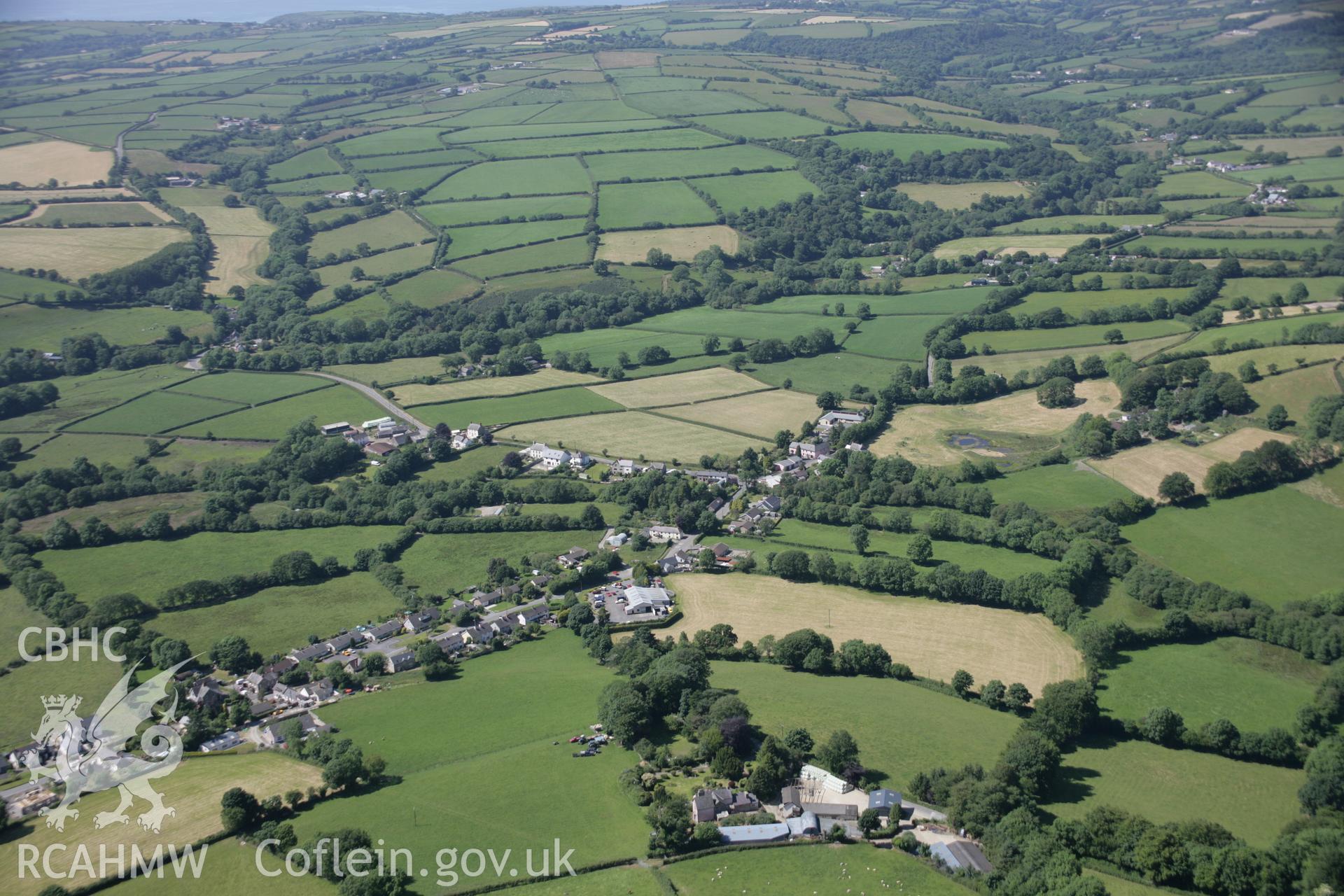 RCAHMW colour oblique aerial photograph of Rhydlewis from the south-east. Taken on 23 June 2005 by Toby Driver