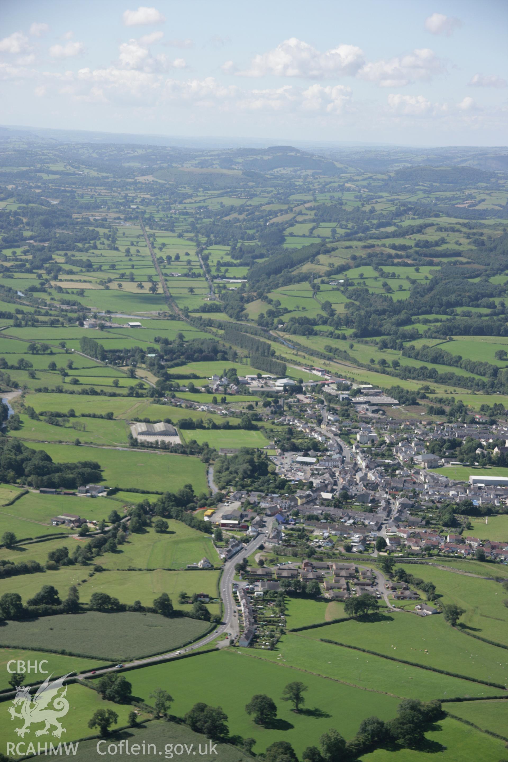 RCAHMW colour oblique aerial photograph of Llandovery townscape in general view from the east. Taken on 02 September 2005 by Toby Driver