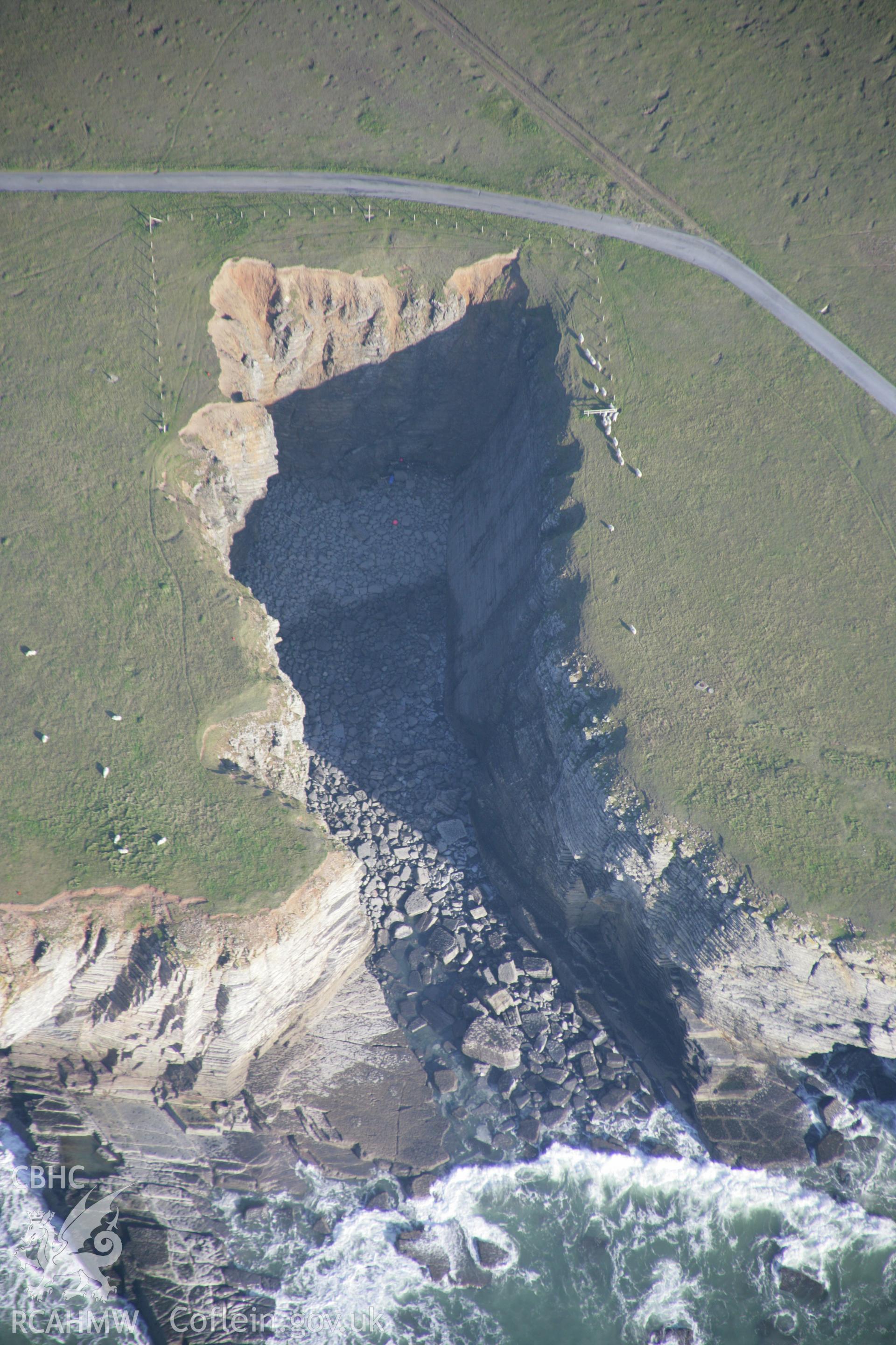 RCAHMW colour oblique aerial photograph of Castlemartin Training Area. A view of the Linney Head Cove. Taken on 19 November 2005 by Toby Driver