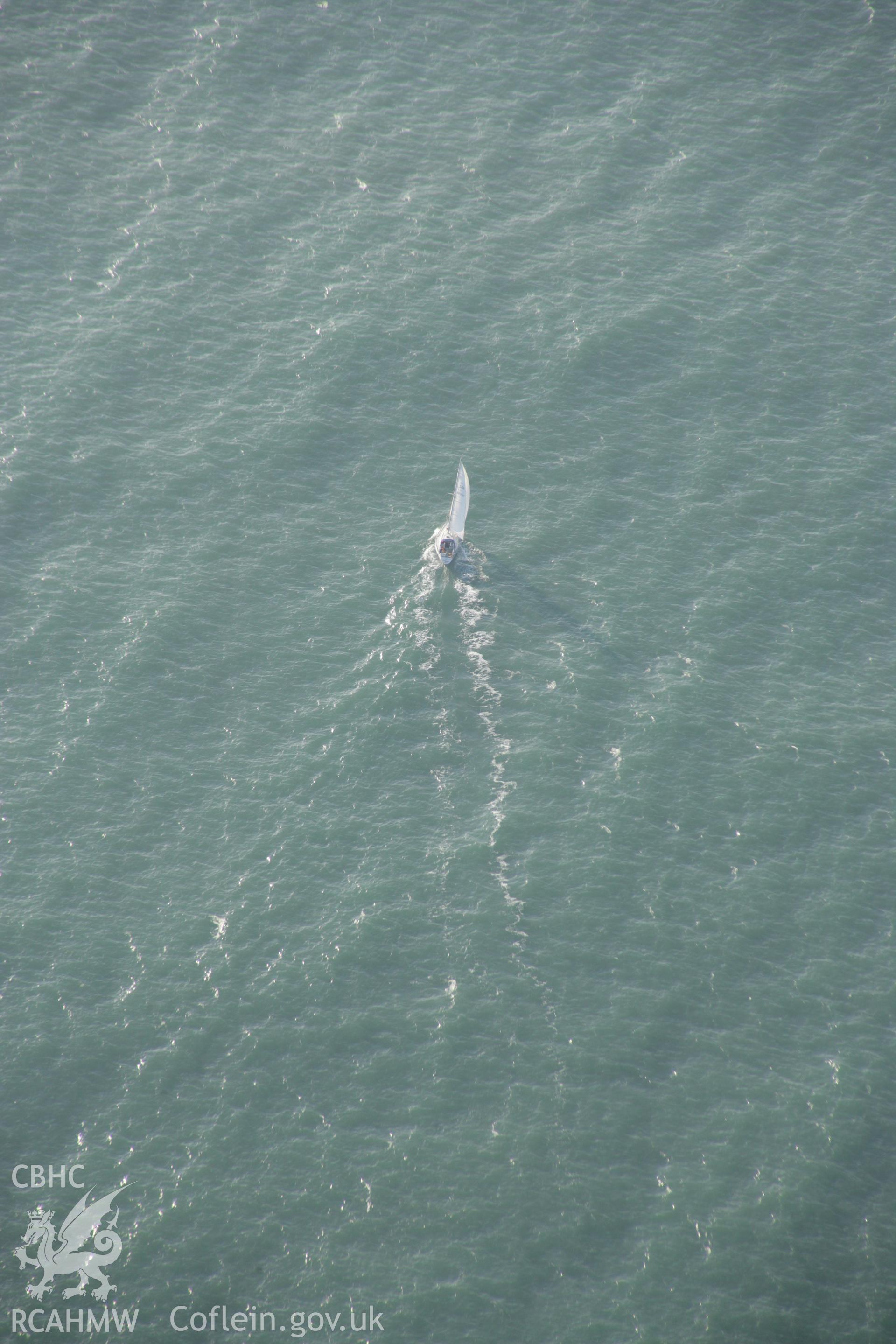 RCAHMW colour oblique aerial photograph of Milford Haven Waterway, showing sailing boat leaving the mouth of the Haven to the south-east of St Ann's Head. Taken on 19 November 2005 by Toby Driver