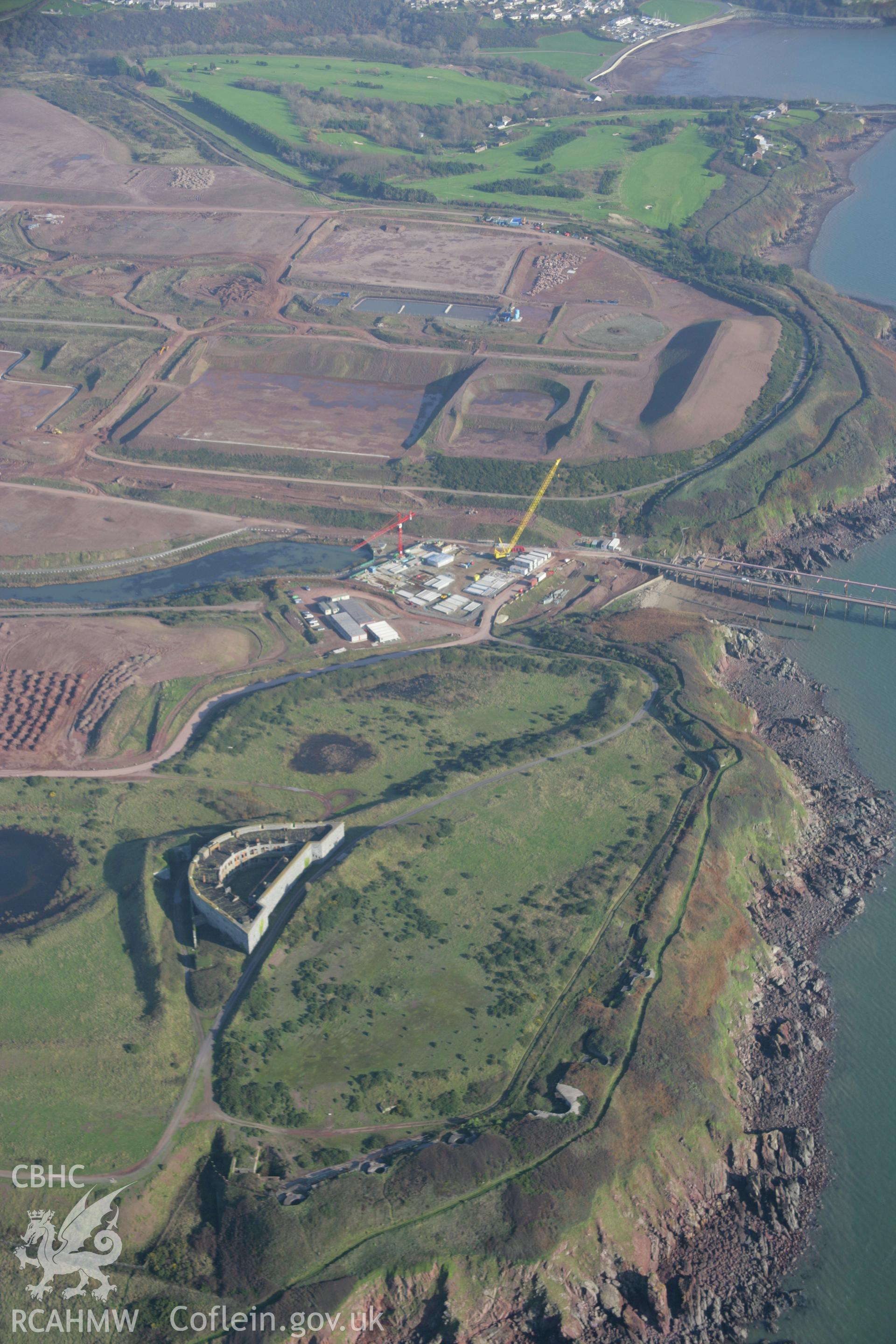 RCAHMW colour oblique aerial photograph of South Hook Fort from the west showing construction of the liquified natural gas depot beyond. Taken on 19 November 2005 by Toby Driver