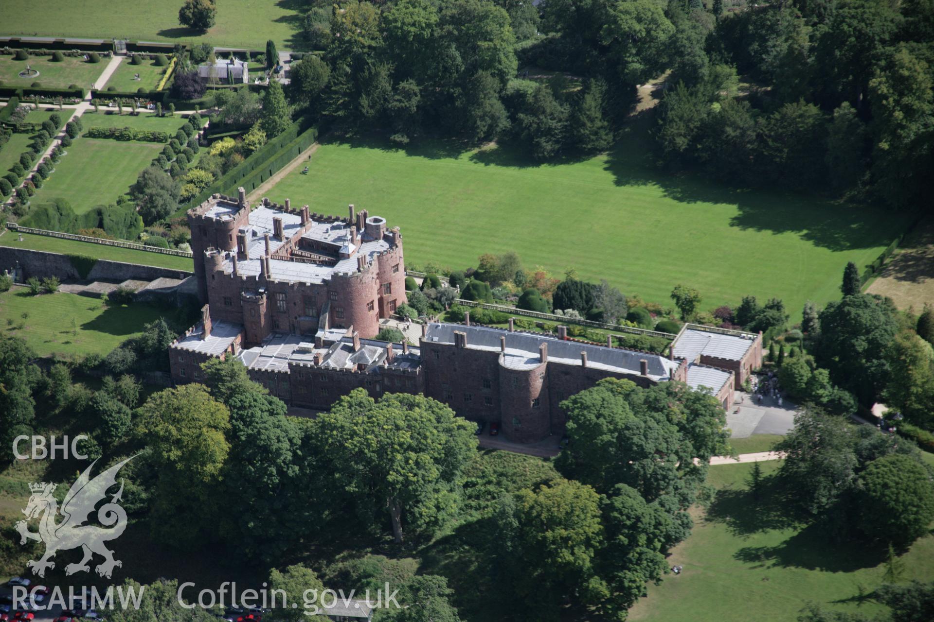 RCAHMW colour oblique aerial photograph of Powis Castle, also showing the gardens, from the north-west. Taken on 02 September 2005 by Toby Driver