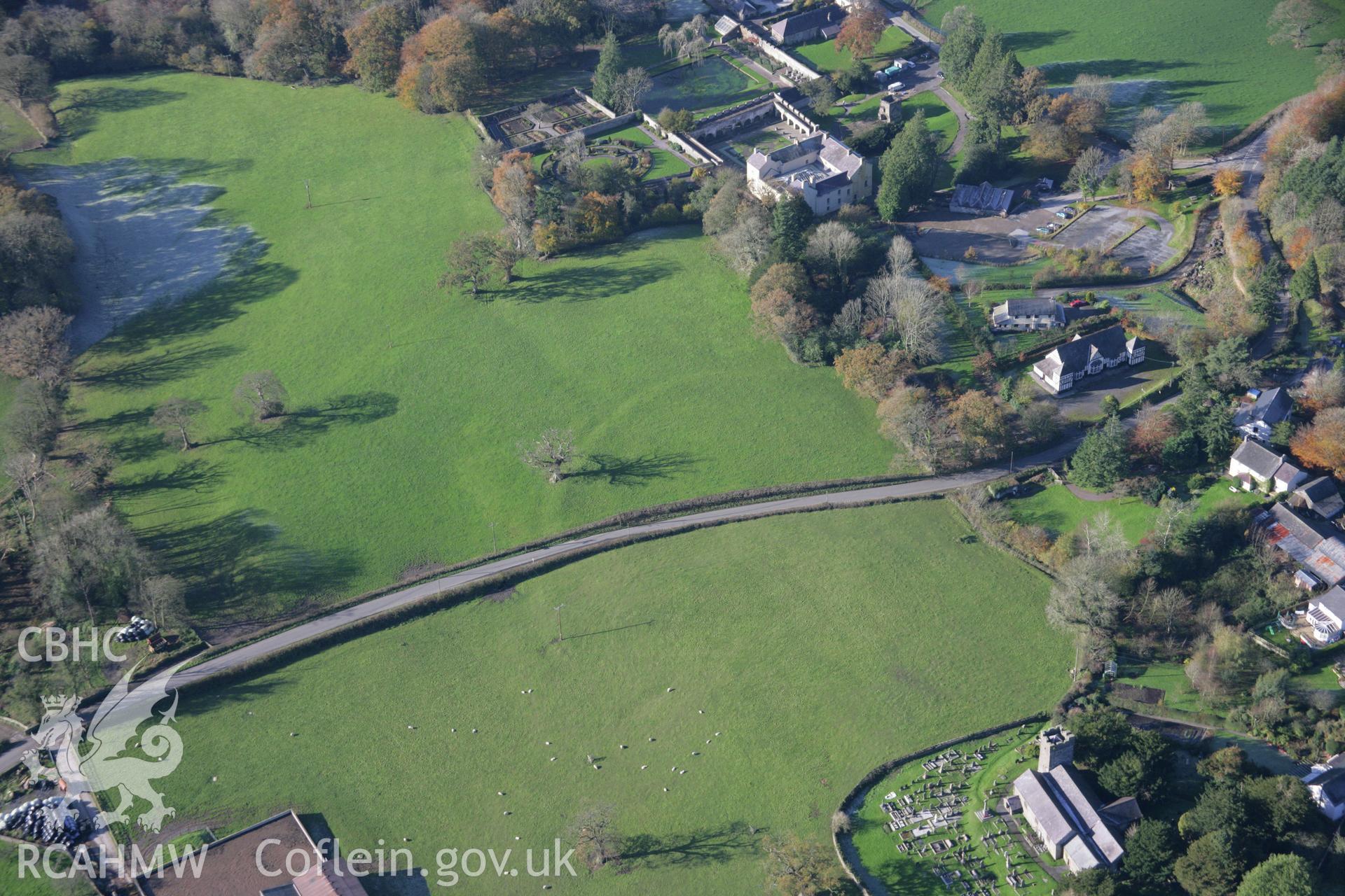 RCAHMW colour oblique photograph of Llangathen enclosure, defended enclosure, view from south-east. Taken by Toby Driver on 17/11/2005.