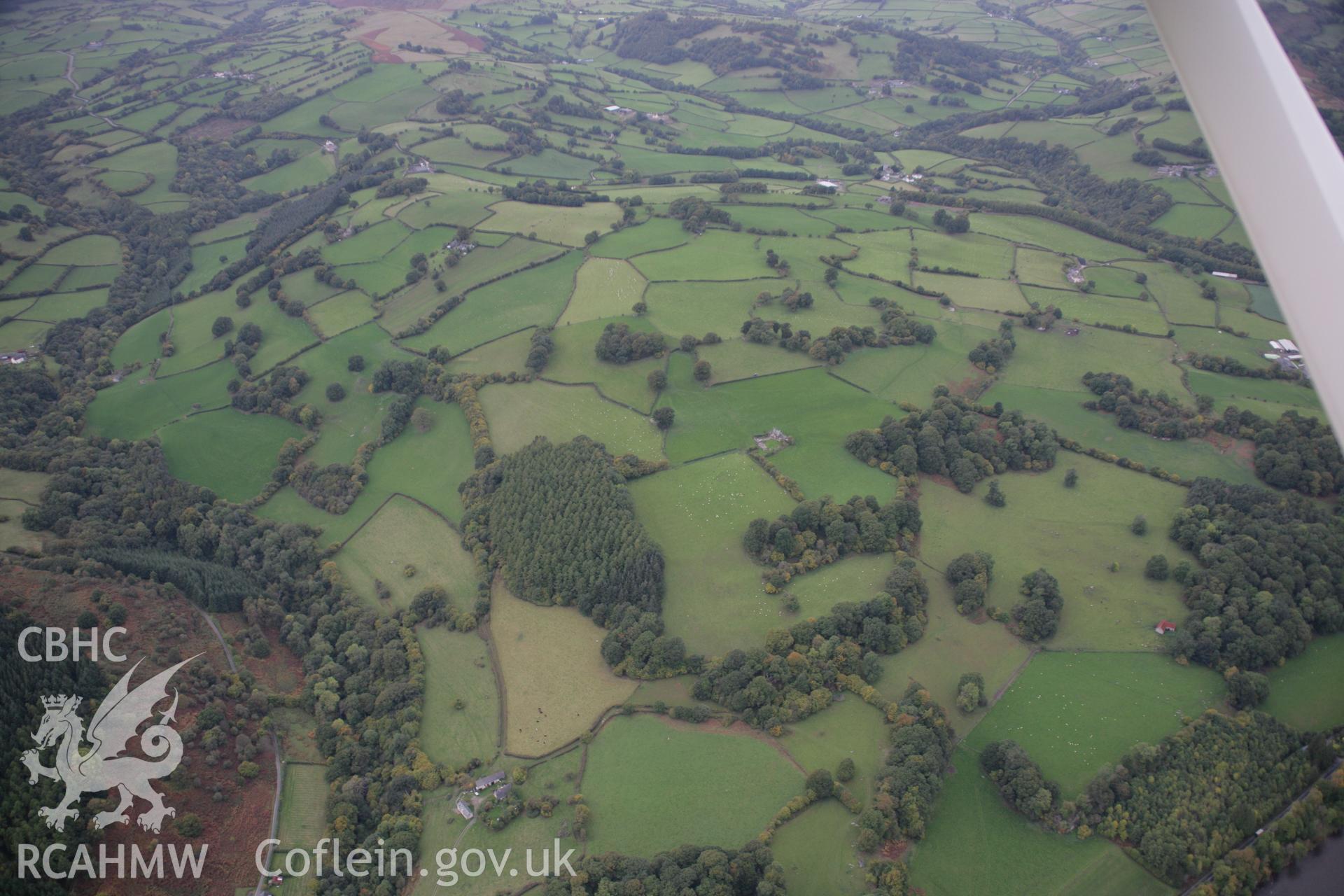 RCAHMW colour oblique aerial photograph of Hafodygarreg. A wide view of its hinterland from the south-east. Taken on 13 October 2005 by Toby Driver