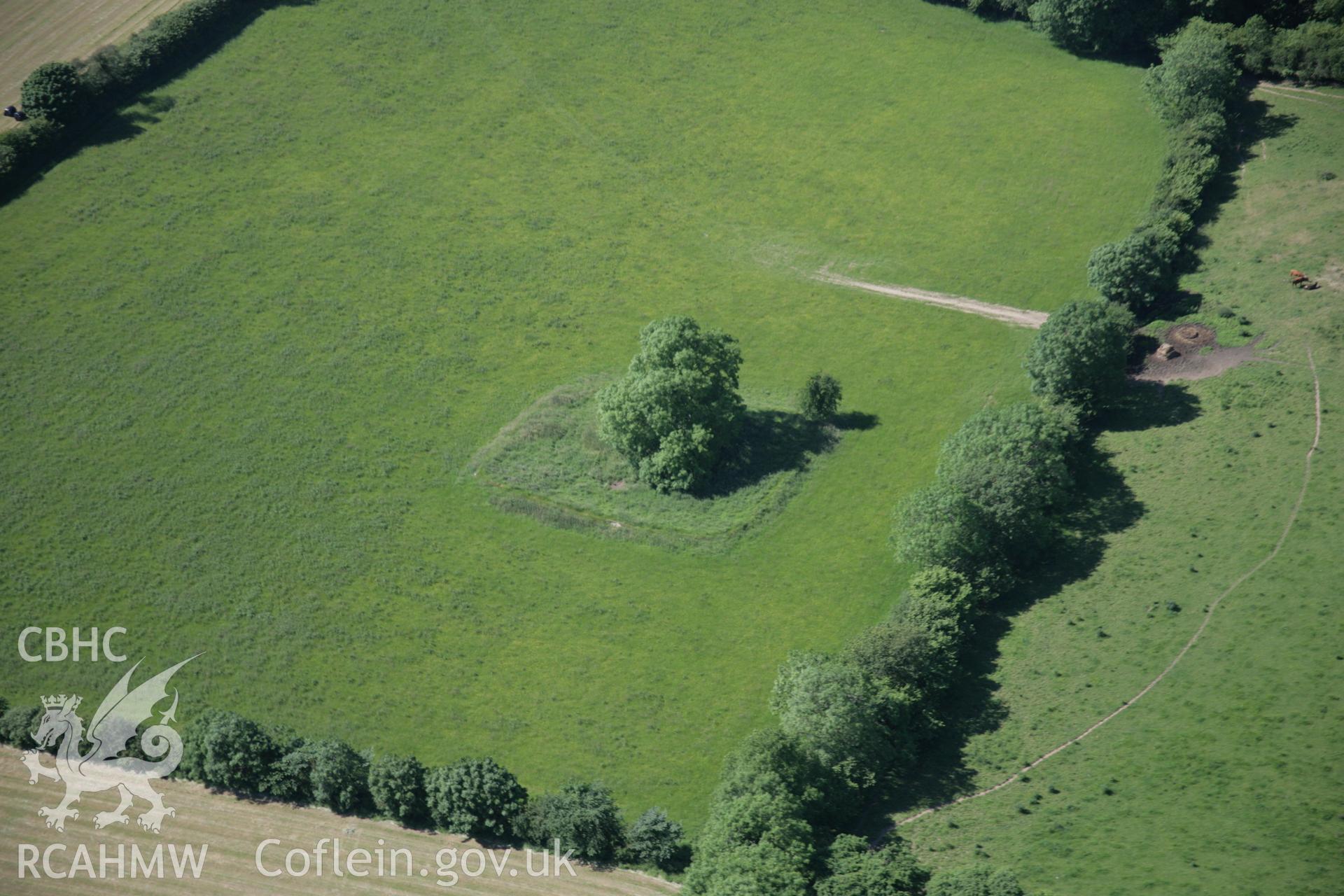 RCAHMW colour oblique aerial photograph of the remains of St.Mary's Church from the south-east. Taken on 23 June 2005 by Toby Driver