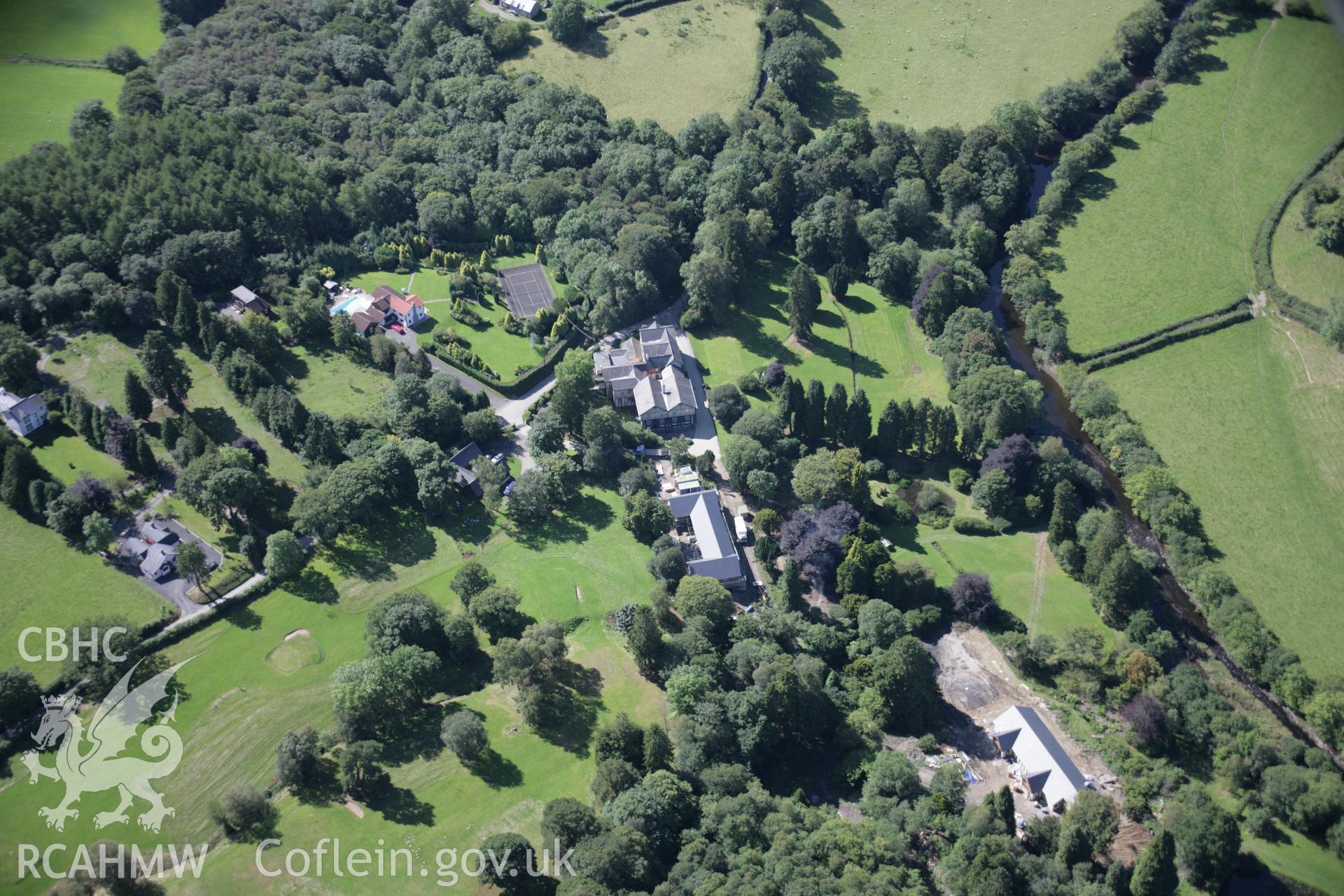 RCAHMW colour oblique aerial photograph of Lake Hotel, Llangammarch Wells showing general view from north-east Taken on 02 September 2005 by Toby Driver