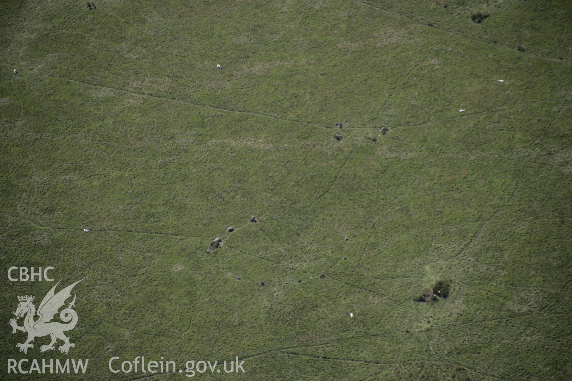 RCAHMW colour oblique aerial photograph of Trecastle Mountain Stone Circles. Taken on 02 September 2005 by Toby Driver