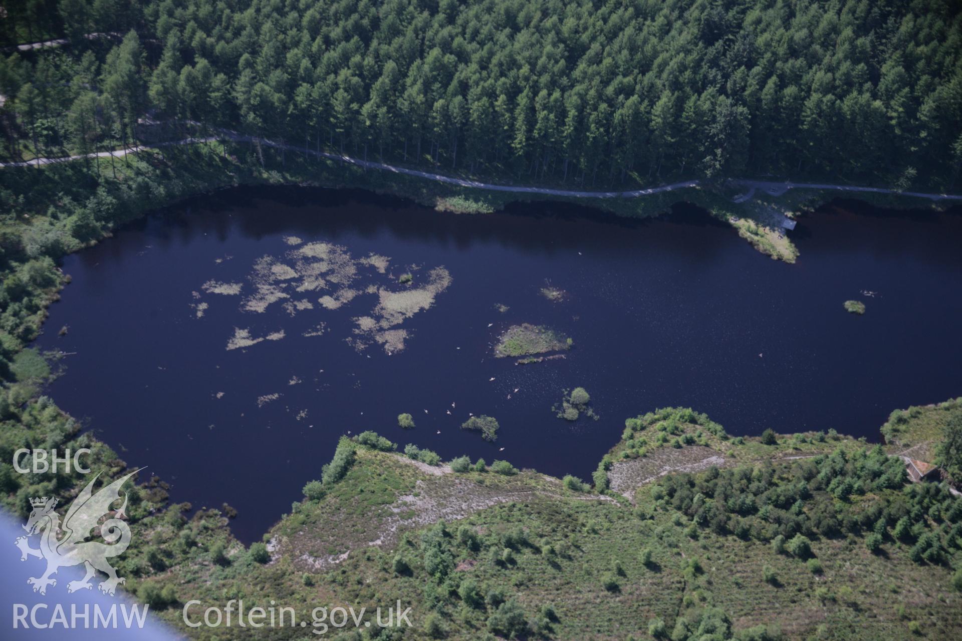 RCAHMW colour oblique aerial photograph of Bwlch Nant-yr-Arian Forest Visitor Centre showing the lake and walks. Taken on 23 June 2005 by Toby Driver
