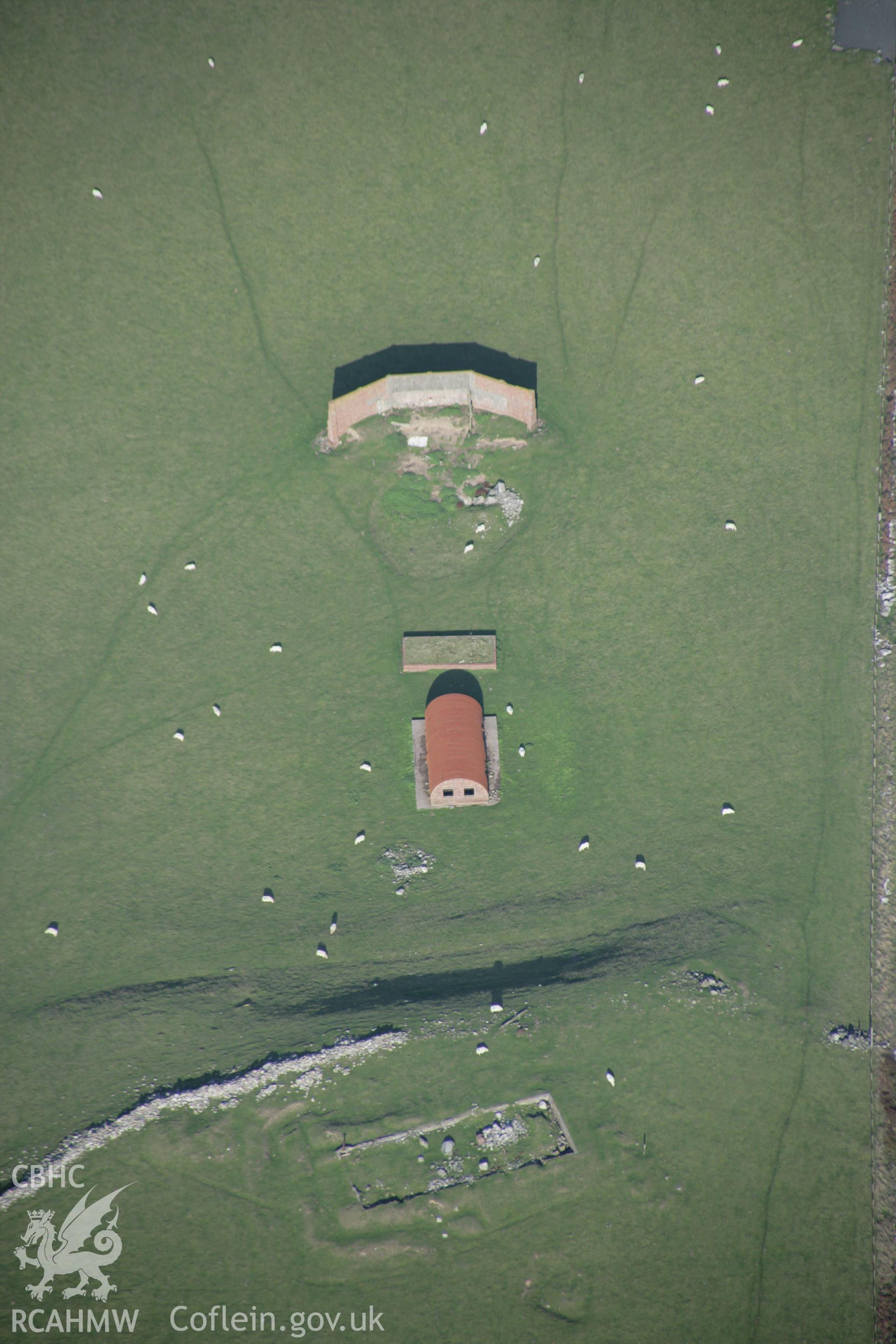 RCAHMW colour oblique aerial photograph of Tonfanau Army Camp. A view of the firing range from the south. Taken on 17 October 2005 by Toby Driver