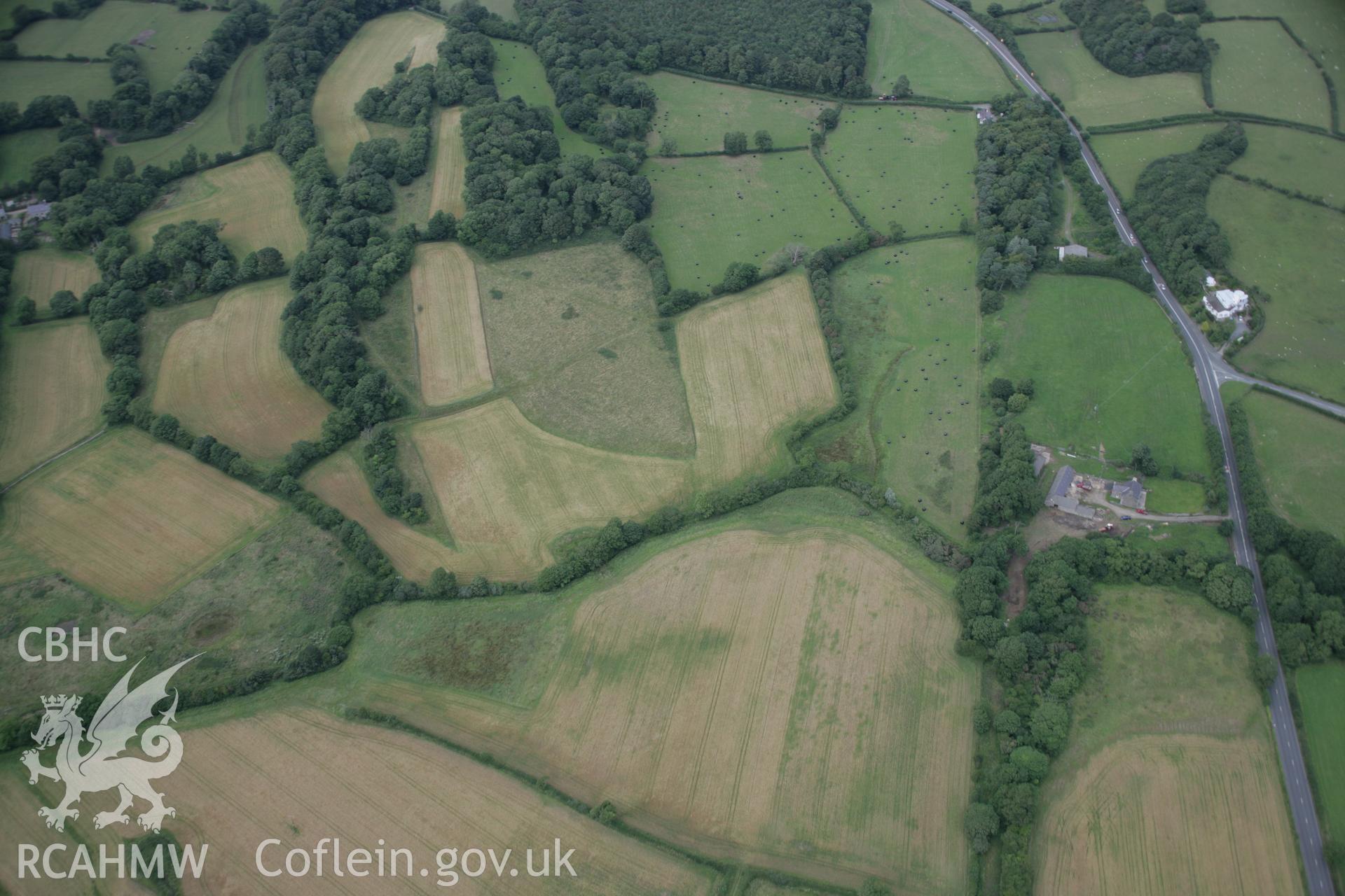 RCAHMW digital colour oblique photograph of the Viking settlement at Glyn, Llanbedrgoch viewed from the south-east. Taken on 02/08/2005 by T.G. Driver.