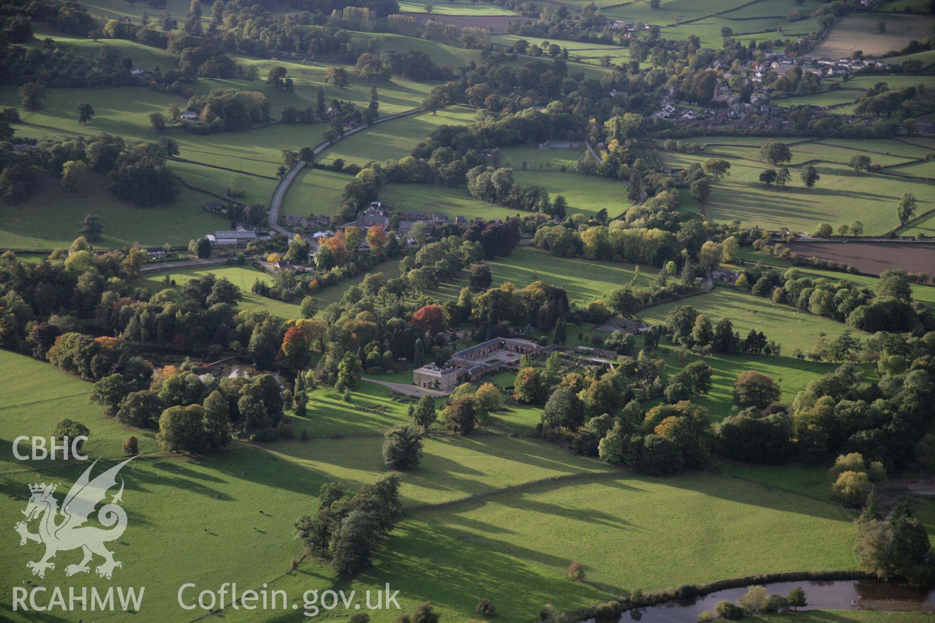 RCAHMW colour oblique aerial photograph of Glansevern Hall Garden, Berriew, with autumn colours, from the east. Taken on 13 October 2005 by Toby Driver
