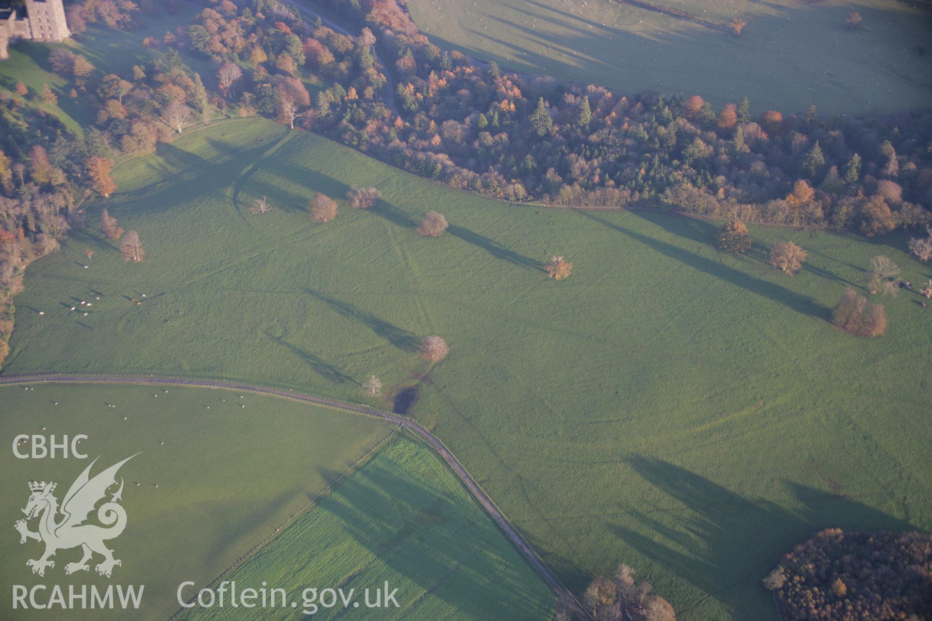 RCAHMW colour oblique aerial photograph of Penryhn Park Earthworks, in general view from the west. Taken on 21 November 2005 by Toby Driver