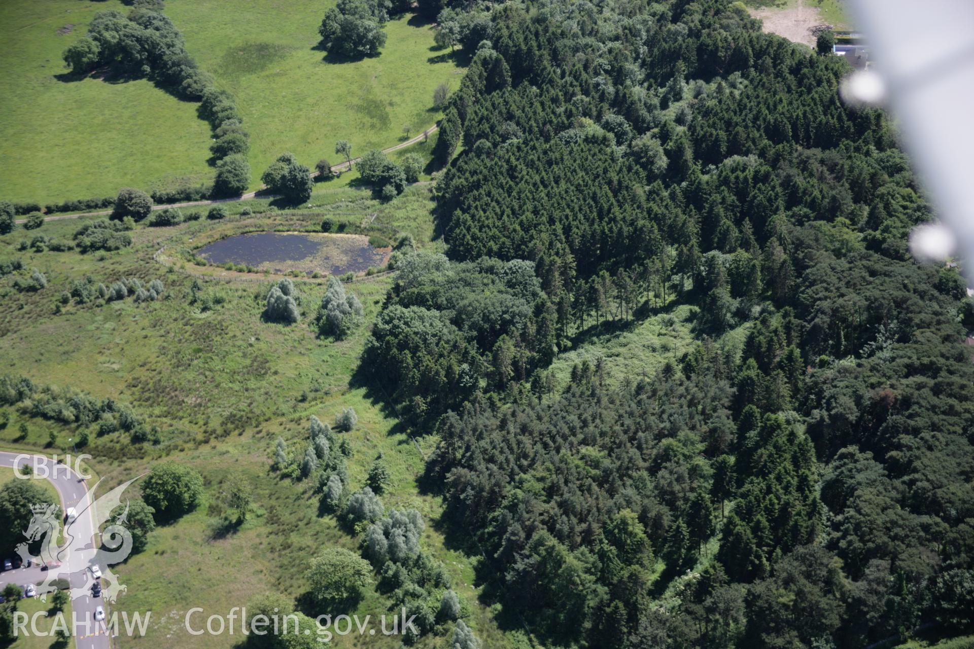 RCAHMW colour oblique aerial photograph of Coity Higher Moat from the north. Taken on 22 June 2005 by Toby Driver