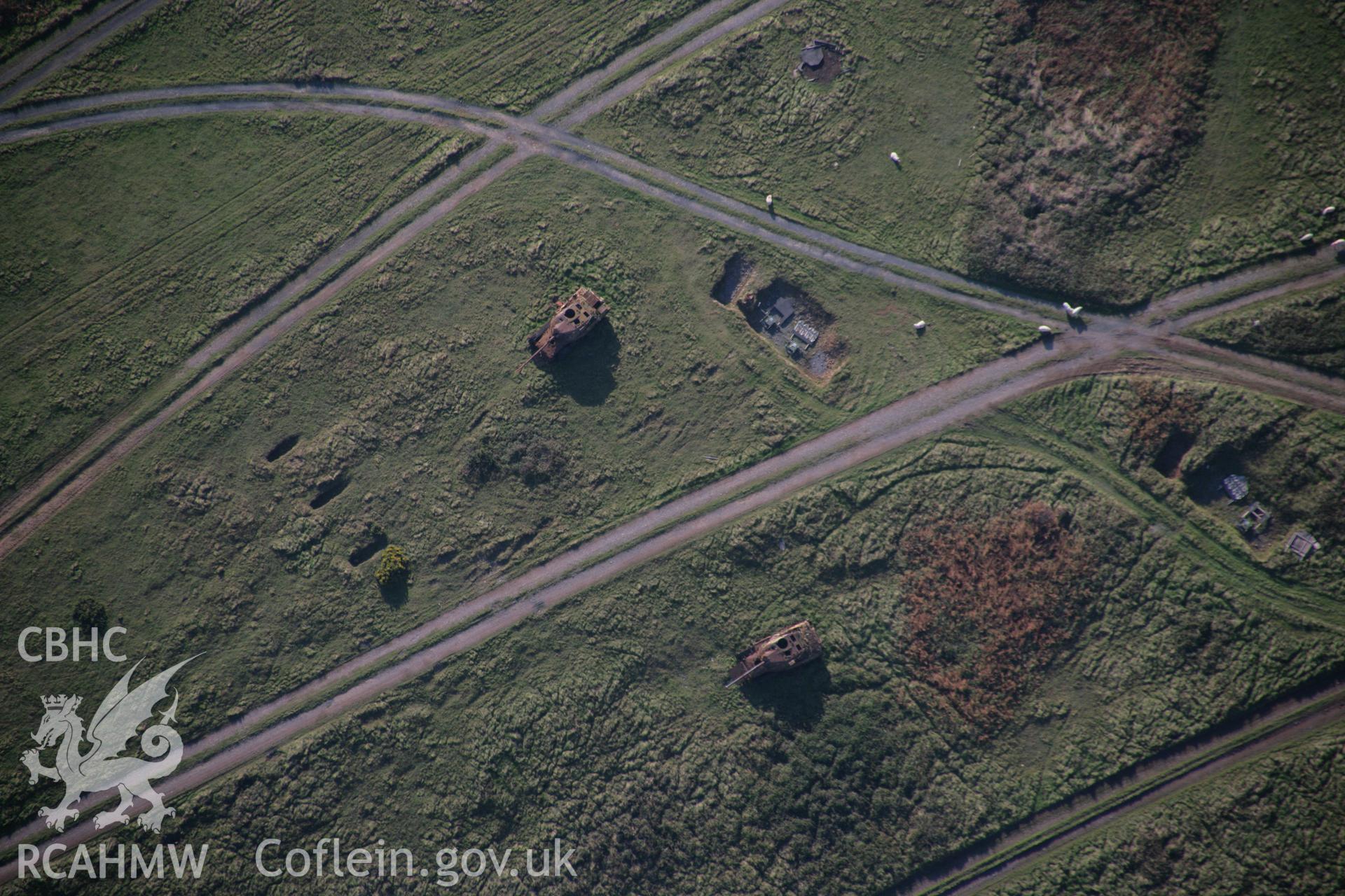 RCAHMW colour oblique aerial photograph of tank 'hard' targets at Mount Sion Covert in the Castlemartin Training Area, viewed from the north-east. Taken on 19 November 2005 by Toby Driver
